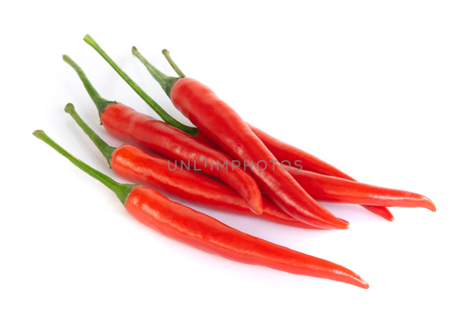 Closeup chilli pepper on white background, raw food ingredient concept