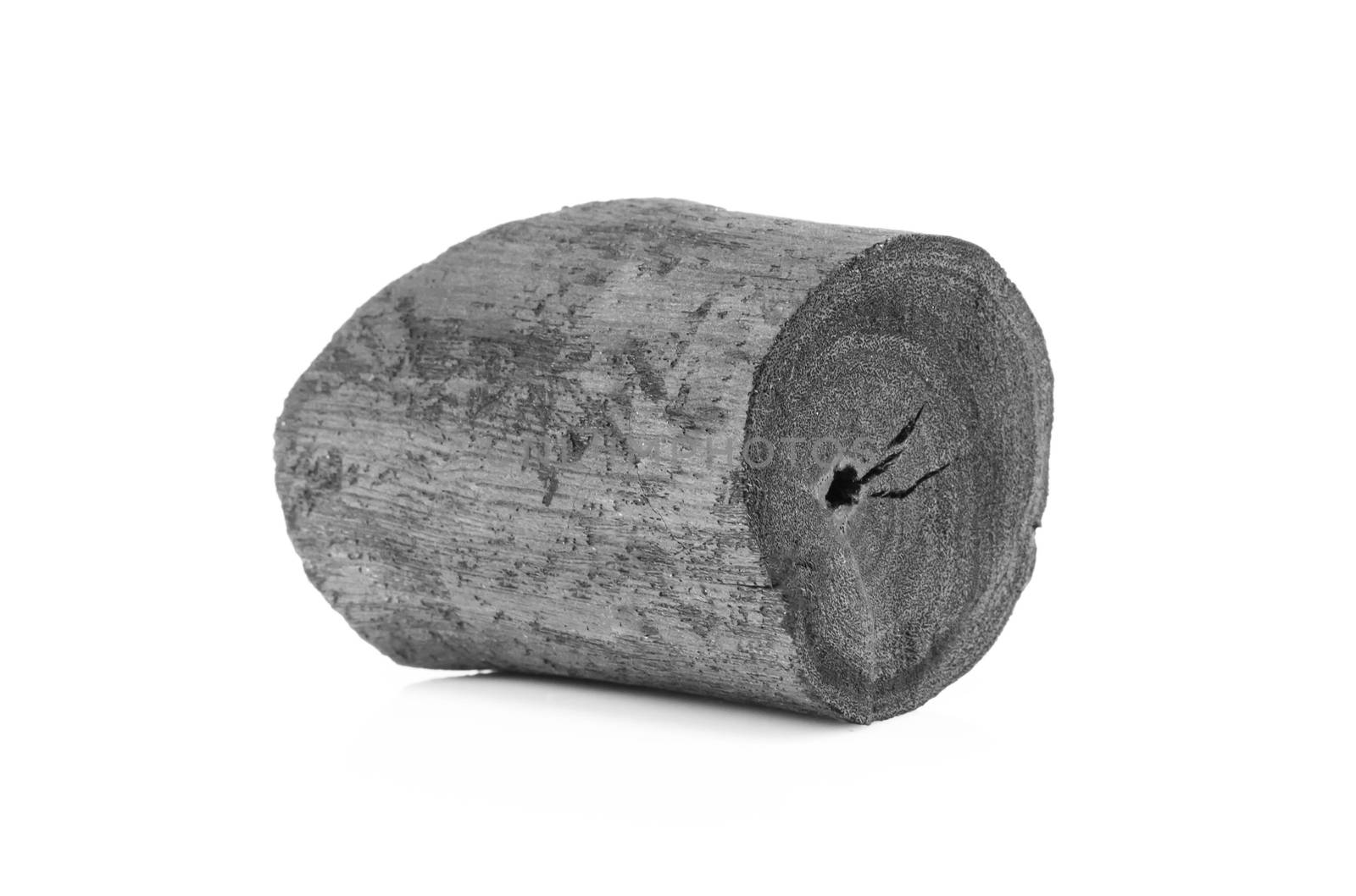Natural black charcoal isolated on white background