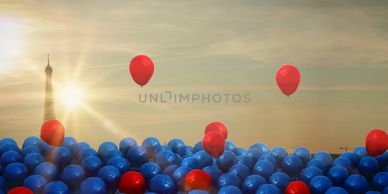 Red and blue balloons against eiffel tower