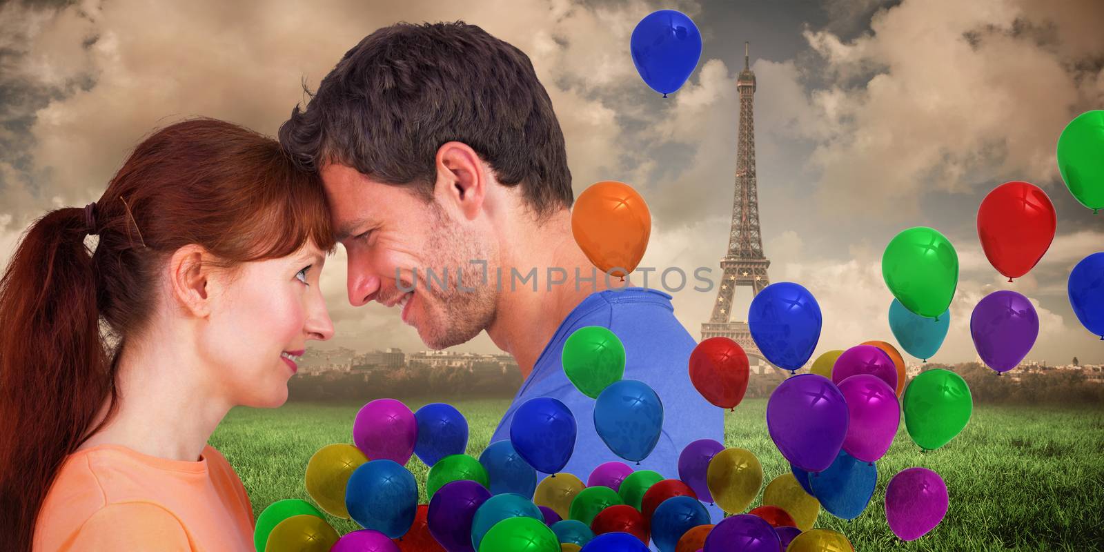 Couple looking at each other against paris under cloudy sky