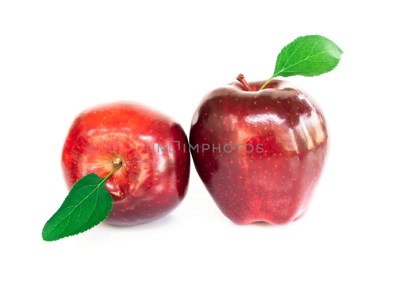 Fresh red apple fruit with green leaf isolated on white background, Healthy food concept