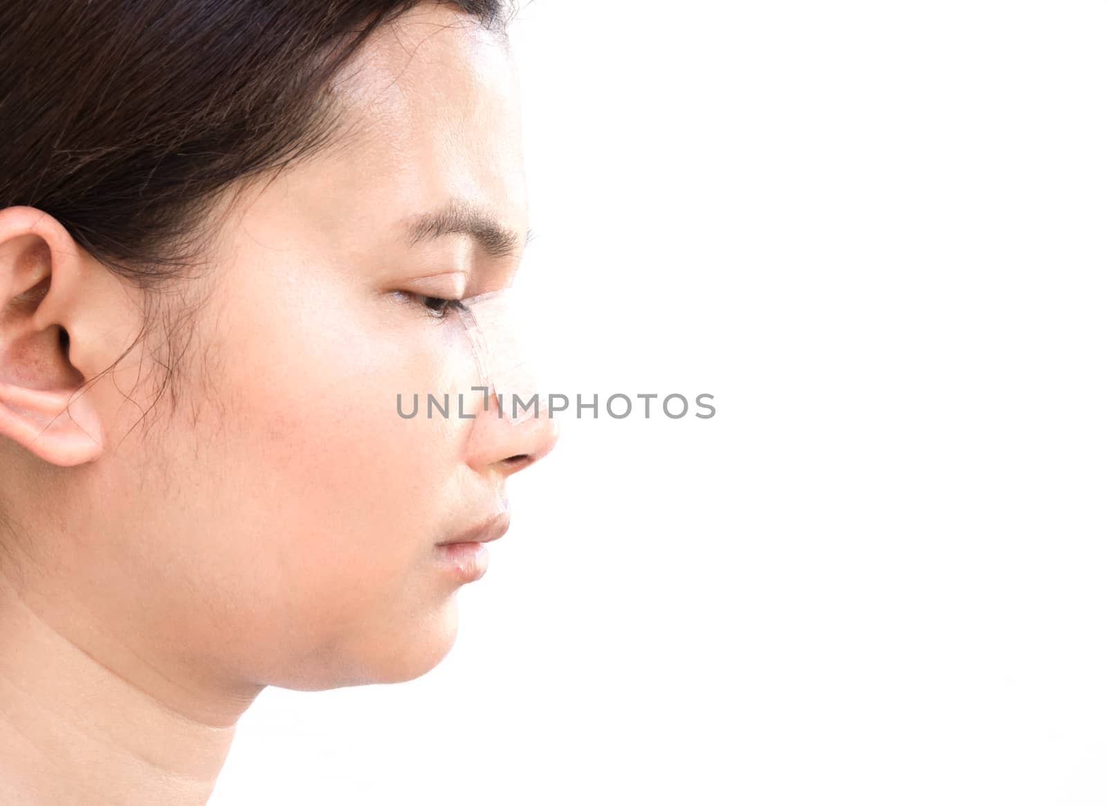 Close up face of asian woman with nose plastic surgery for beauty and cosmetic concept, white background