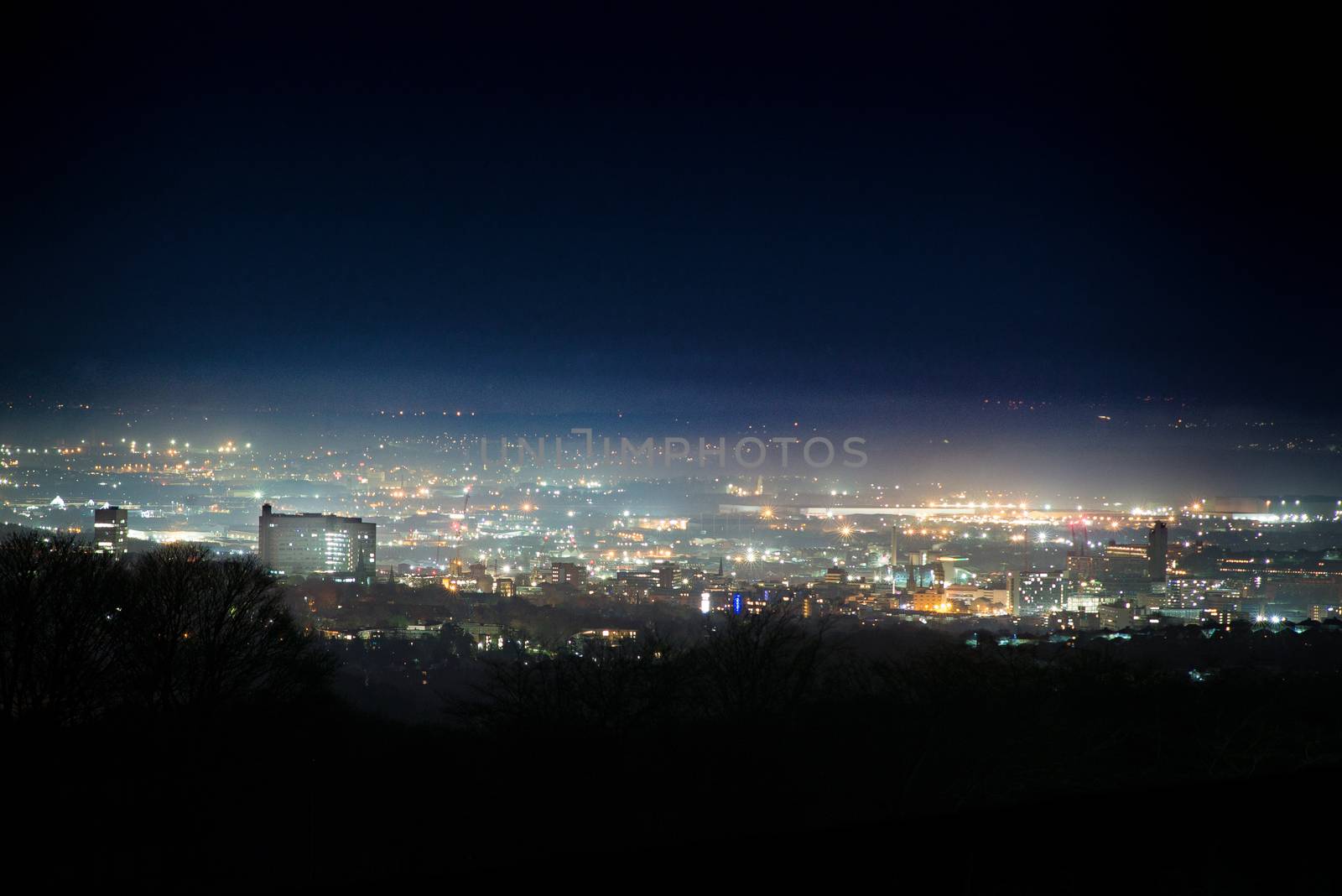 looking from the west over sheffield's skyline at night, featuring the royal hallamshire hospital