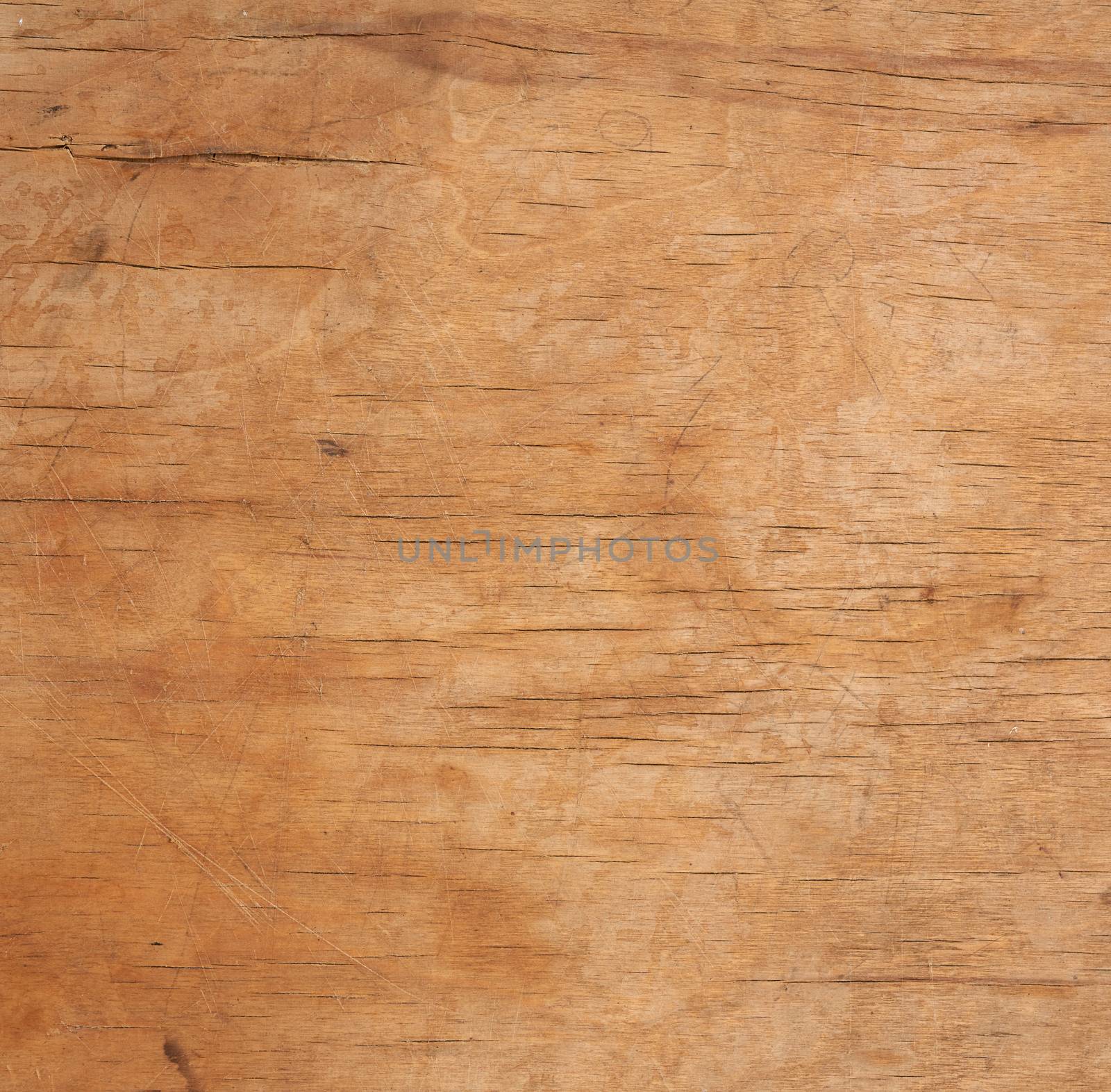 texture of a old brown wooden cutting board, full frame, backdrop for the designer, close up