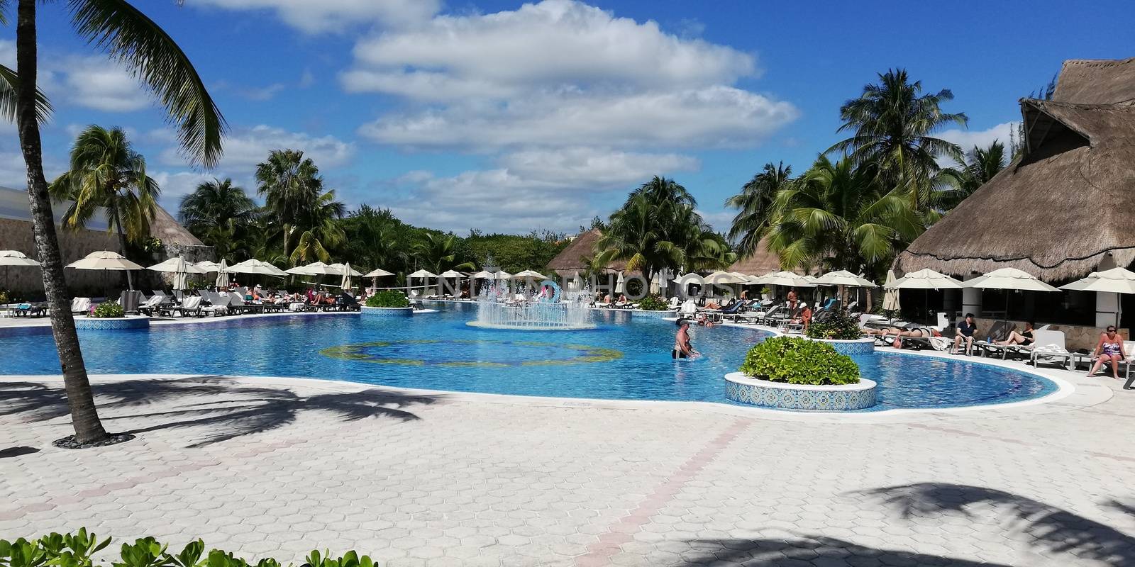CANCUN, MEXICO 25 MARCH 2020: Mexican resort pool in sunny day