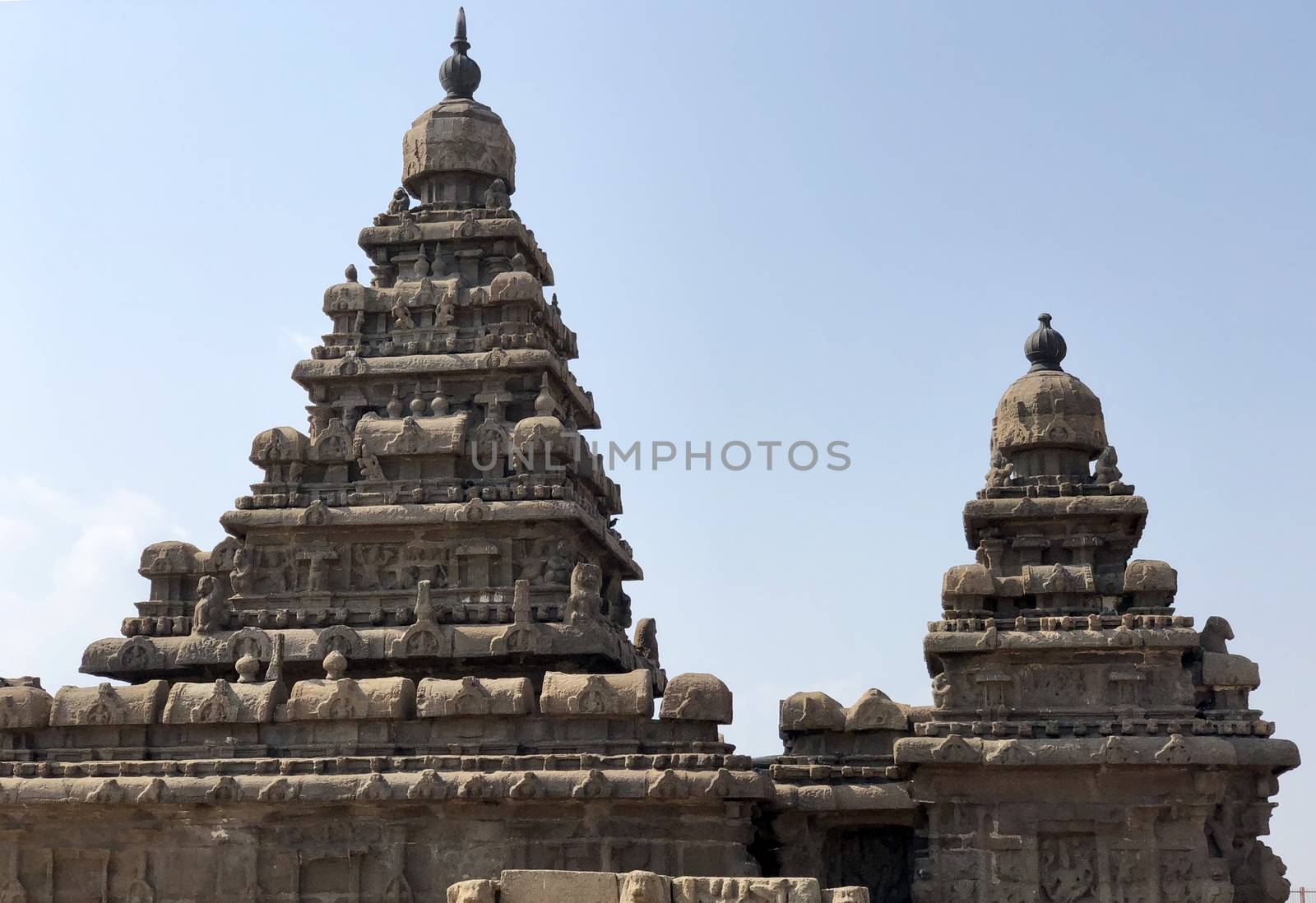 Shore temple is the structural building built with the block of granite at 8th Century AD. It is one of the Group of Monuments at Mahabalipuram and it has been classified as a UNESCO World Heritage Site. Shore temple is the oldest structural rock-cut stone temples of South India and contains complex of temples and shrines. This temple complex is initiated by King  Narasimhavarman II and it is called one of the Seven Pagodas in ancient times.