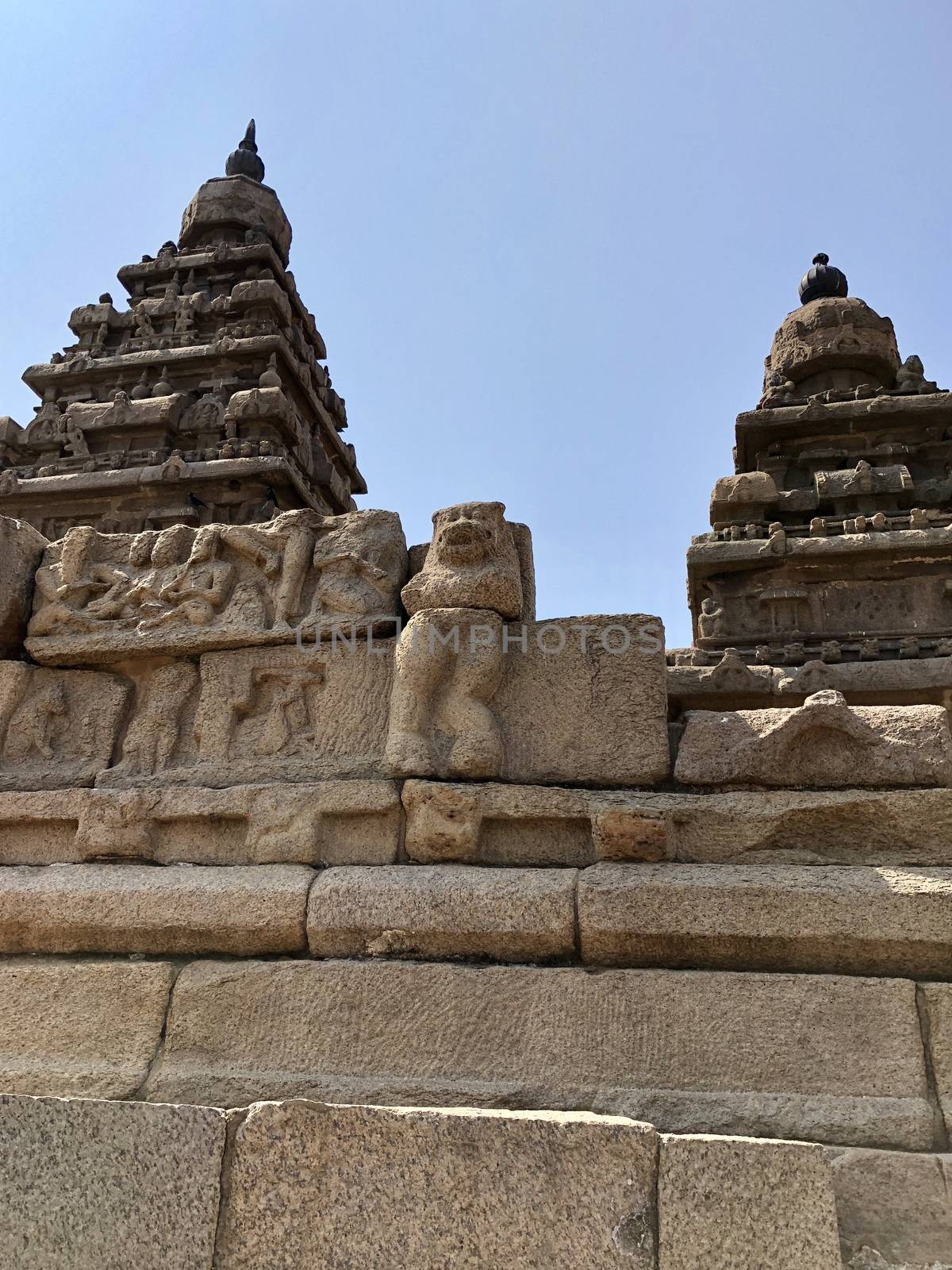 Shore temple is the structural building built with the block of granite at 8th Century AD. It is one of the Group of Monuments at Mahabalipuram and it has been classified as a UNESCO World Heritage Site. Shore temple is the oldest structural rock-cut stone temples of South India and contains complex of temples and shrines. This temple complex is initiated by King  Narasimhavarman II and it is called one of the Seven Pagodas in ancient times.