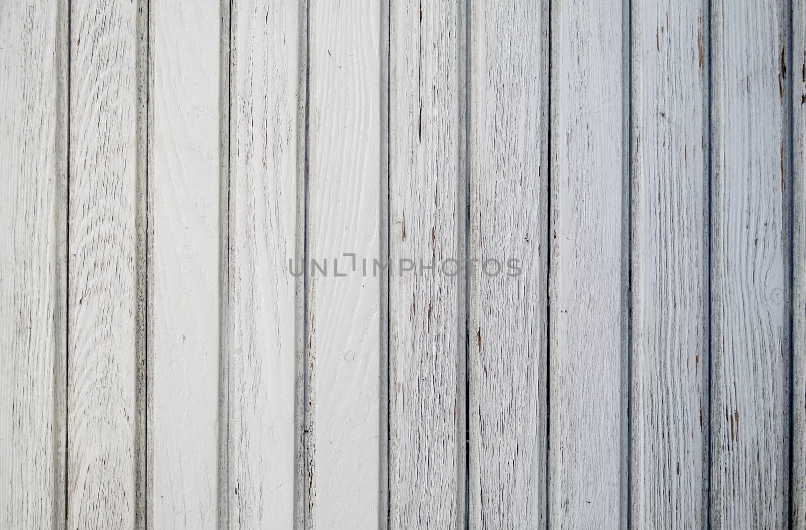 vintage detailed texture of wooden planks covered with white paint