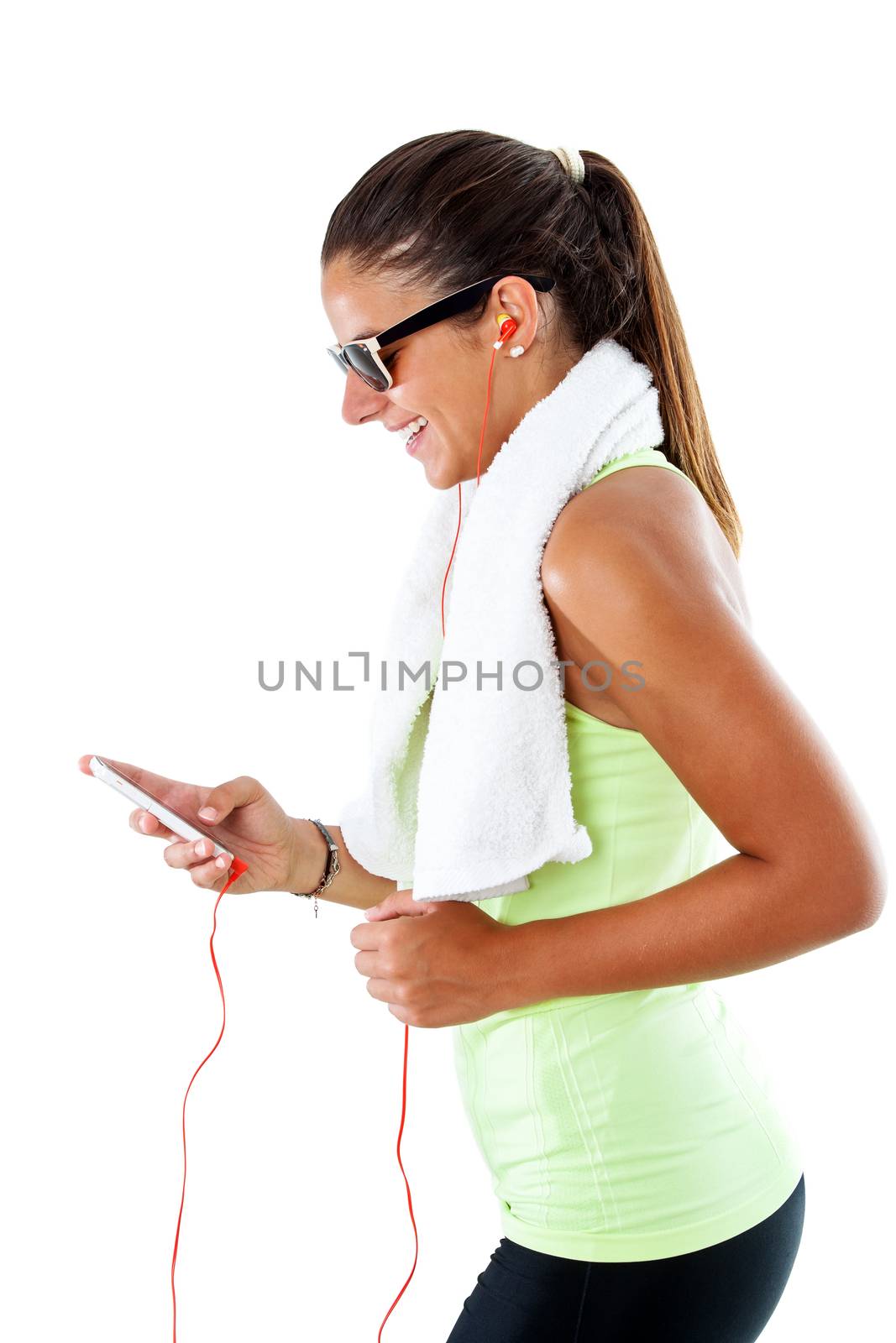 Close up portrait of attractive girl wearing sunglasses doing aerobic workout with smart phone. Isolated on white background.