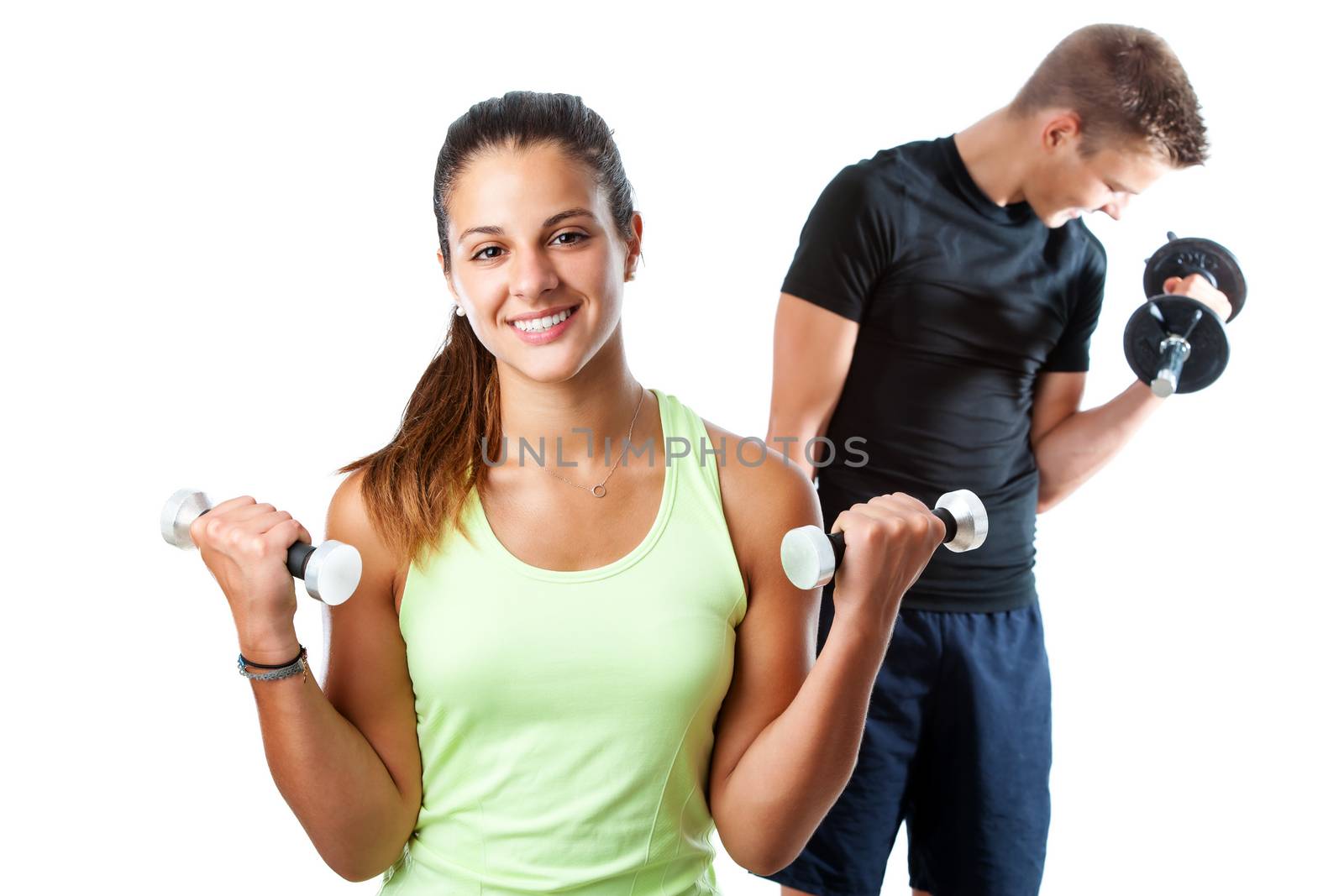 Close up portrait of attractive teen girl doing aerobic workout with boy in background. Isolated on white background.