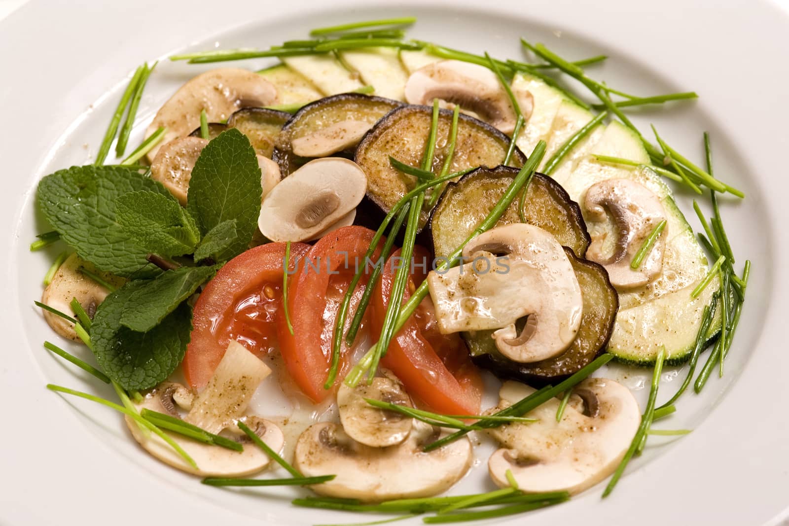 Vegetable salad with raw champignons. Healthy vegetarian food.
