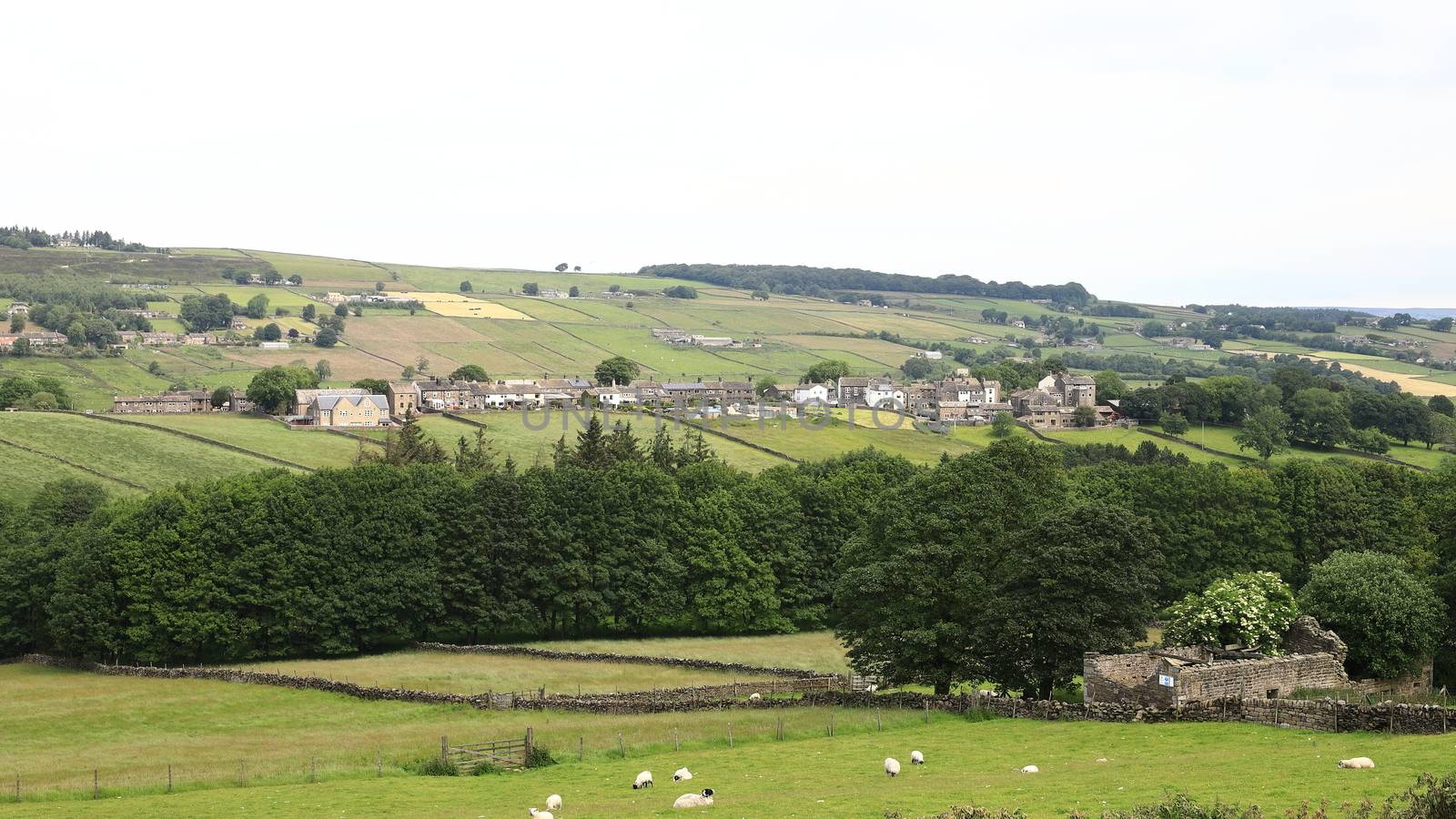 The view across countryside towards the village of Stanbury in the parish of Haworth, West Yorkshire in Northern England.