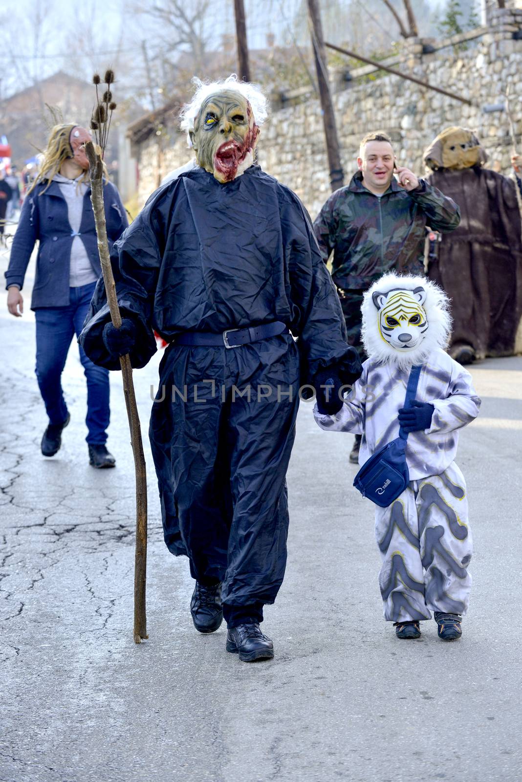 VEVCANI, MACEDONIA - 13 JANUARY , 2020: General atmosphere with dressed up participants at an annual Vevcani Carnival, in southwestern Macedonia, by nehru