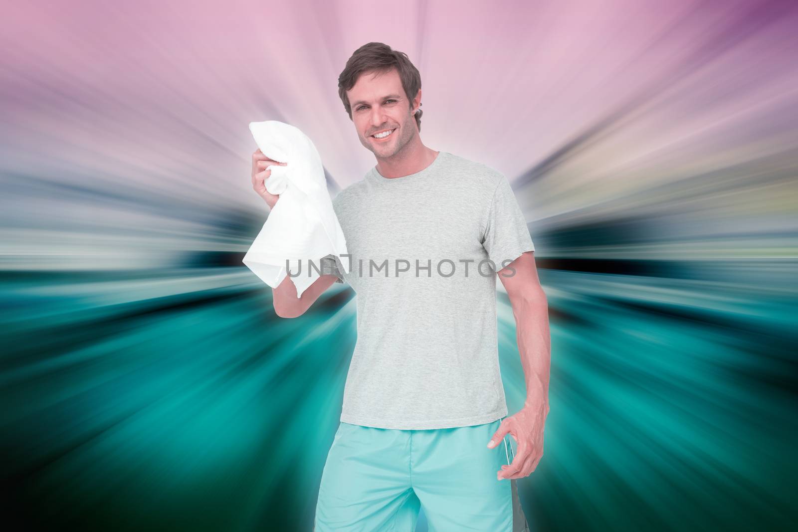 Composite image of portrait of a fit young man with towel by Wavebreakmedia