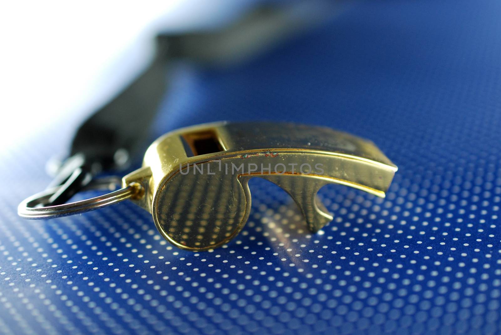 old used gold colored soccer referee whistle image