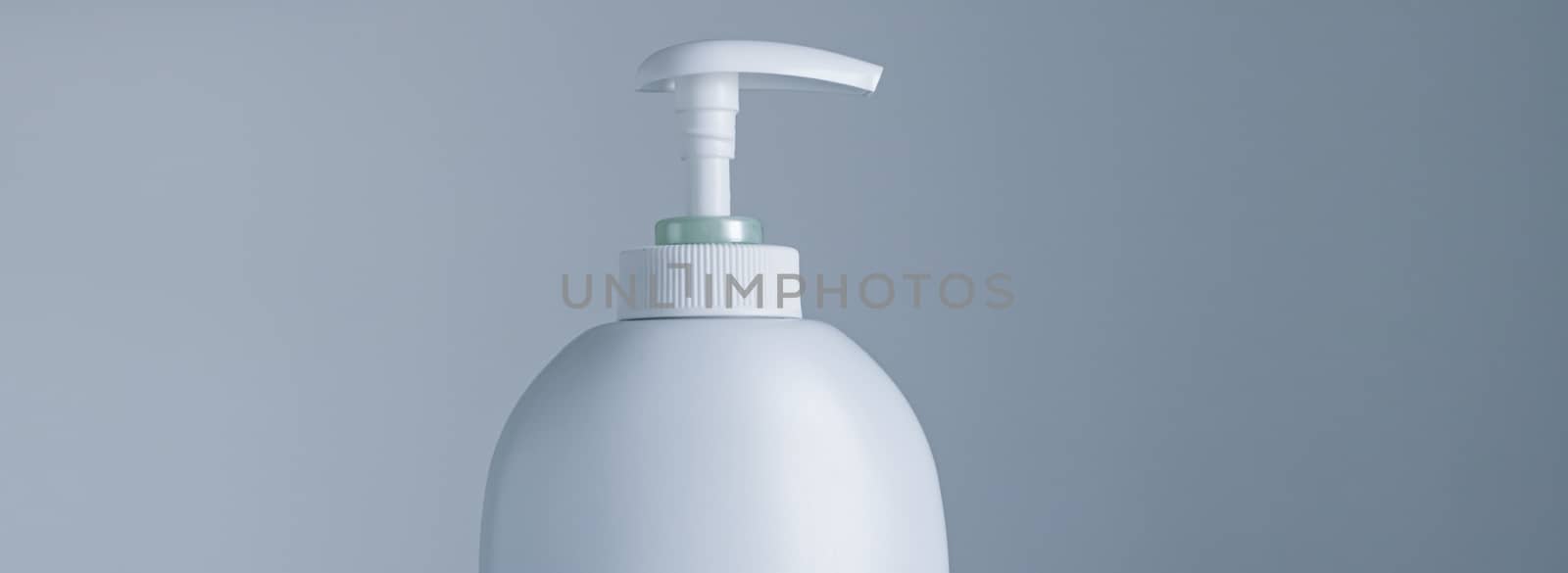 Blank label cosmetic container bottle as product mockup on gray background by Anneleven