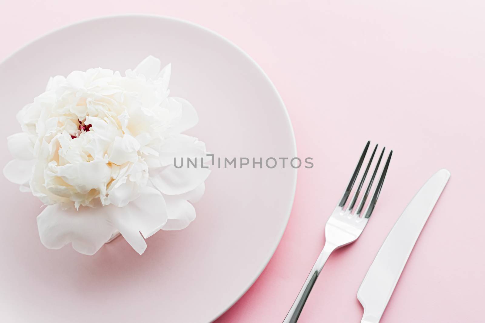 Dining plate and cutlery with peony flower as wedding decor set on pink background, top tableware for event decoration and dessert menu design