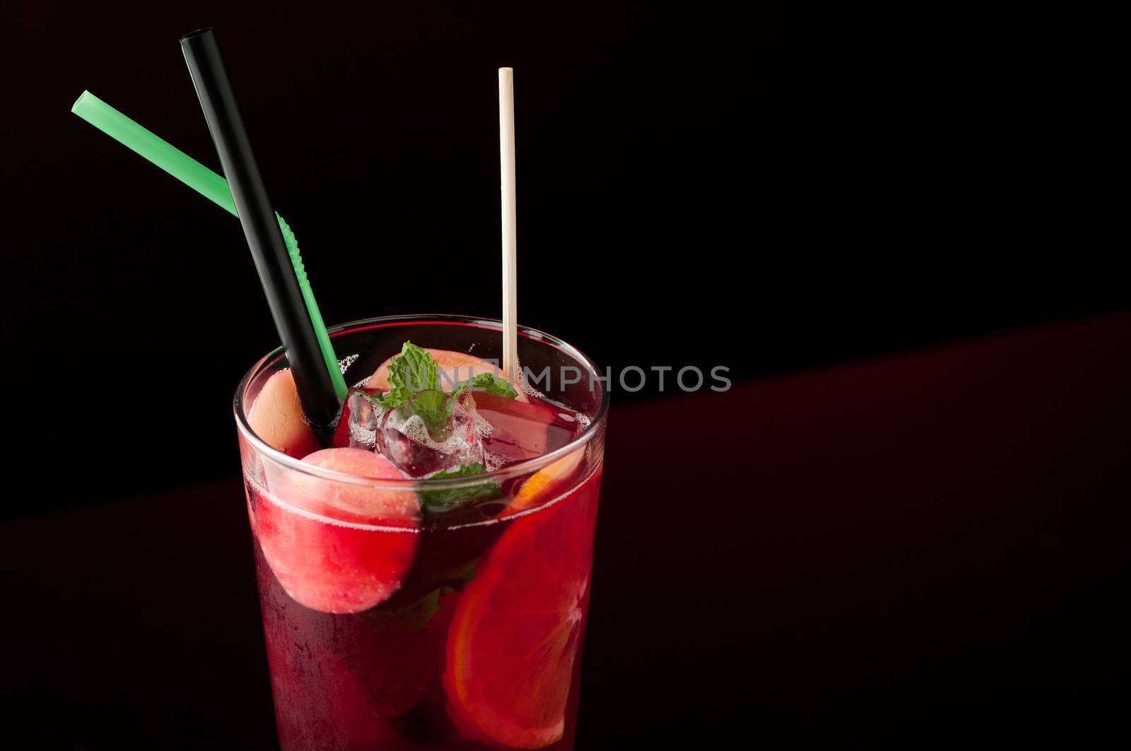ice tea in a glass on a dark background