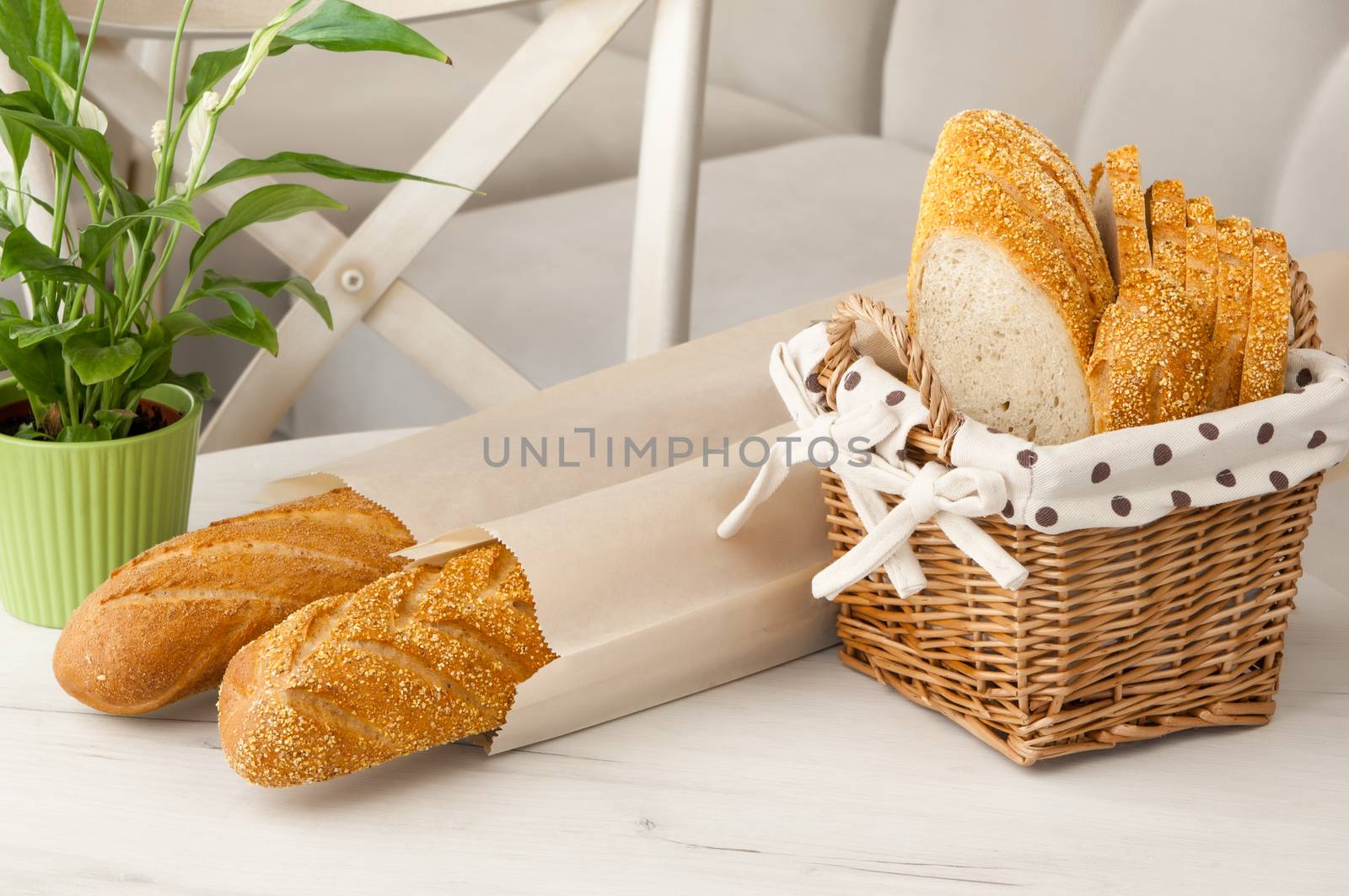 bread in a wicker basket on a light background on a table