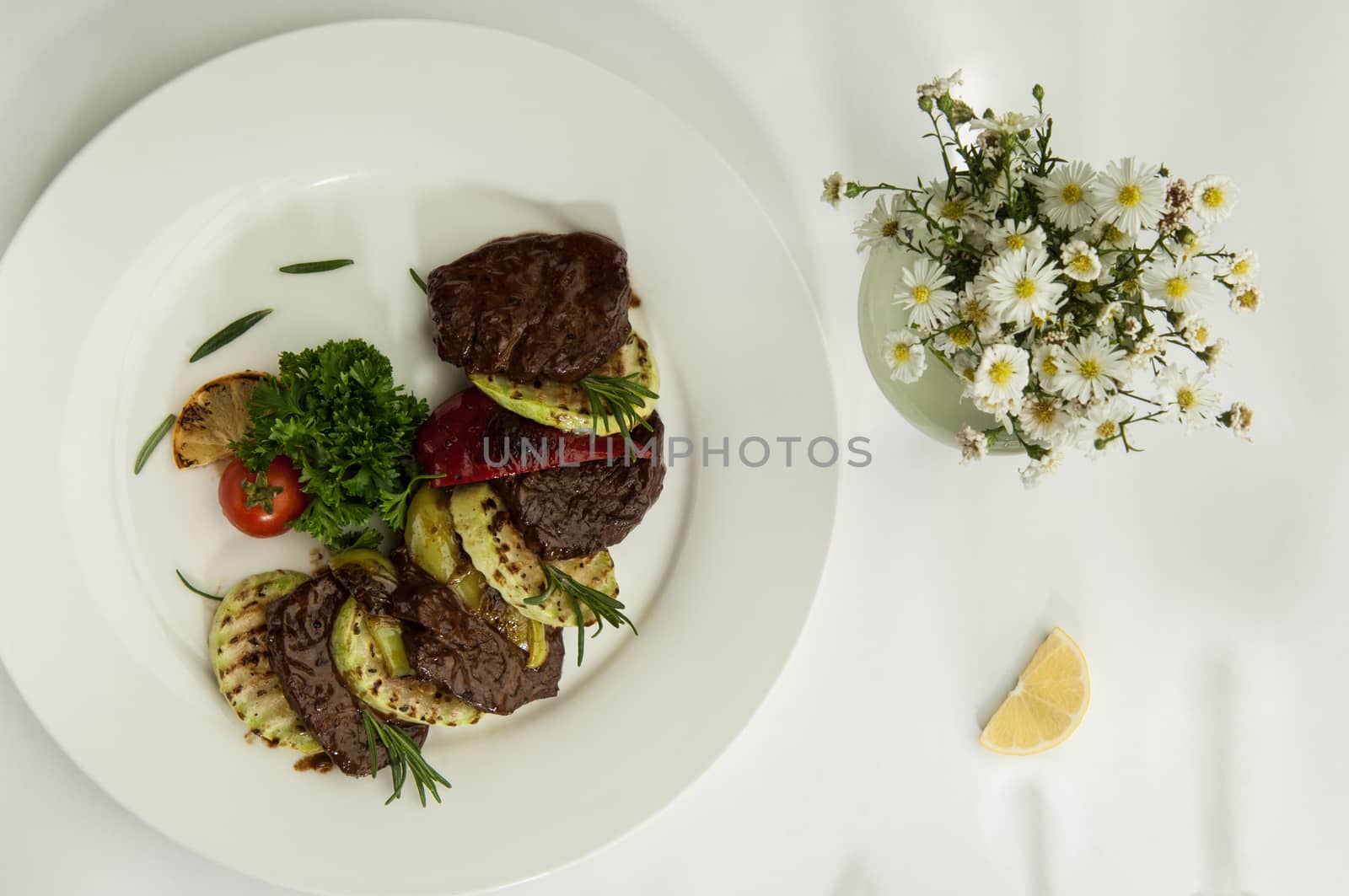 food in a dish on a white surface by A_Karim