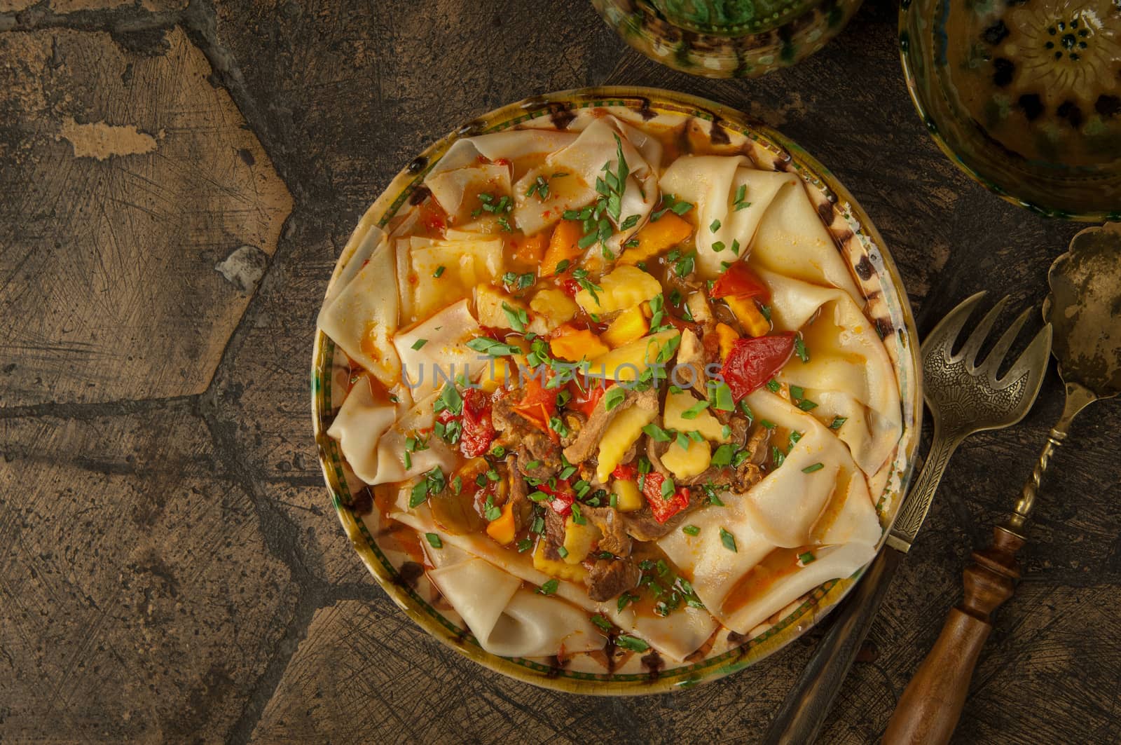 oriental dishes on decorative old tiles. dish dough