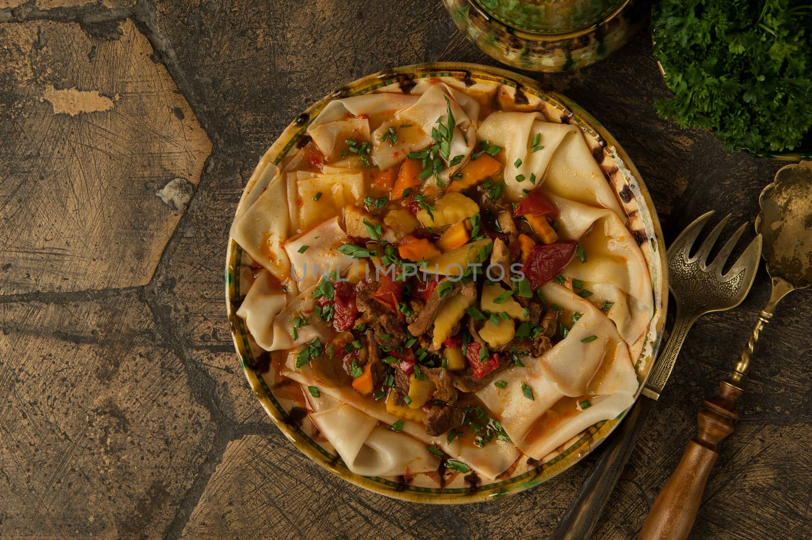 meat dish on an old paving stone by A_Karim