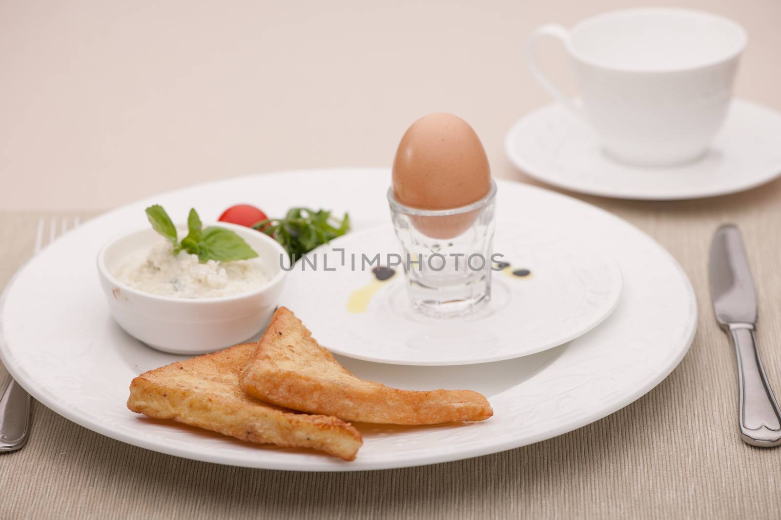 breakfast served with fried bread and egg and curd