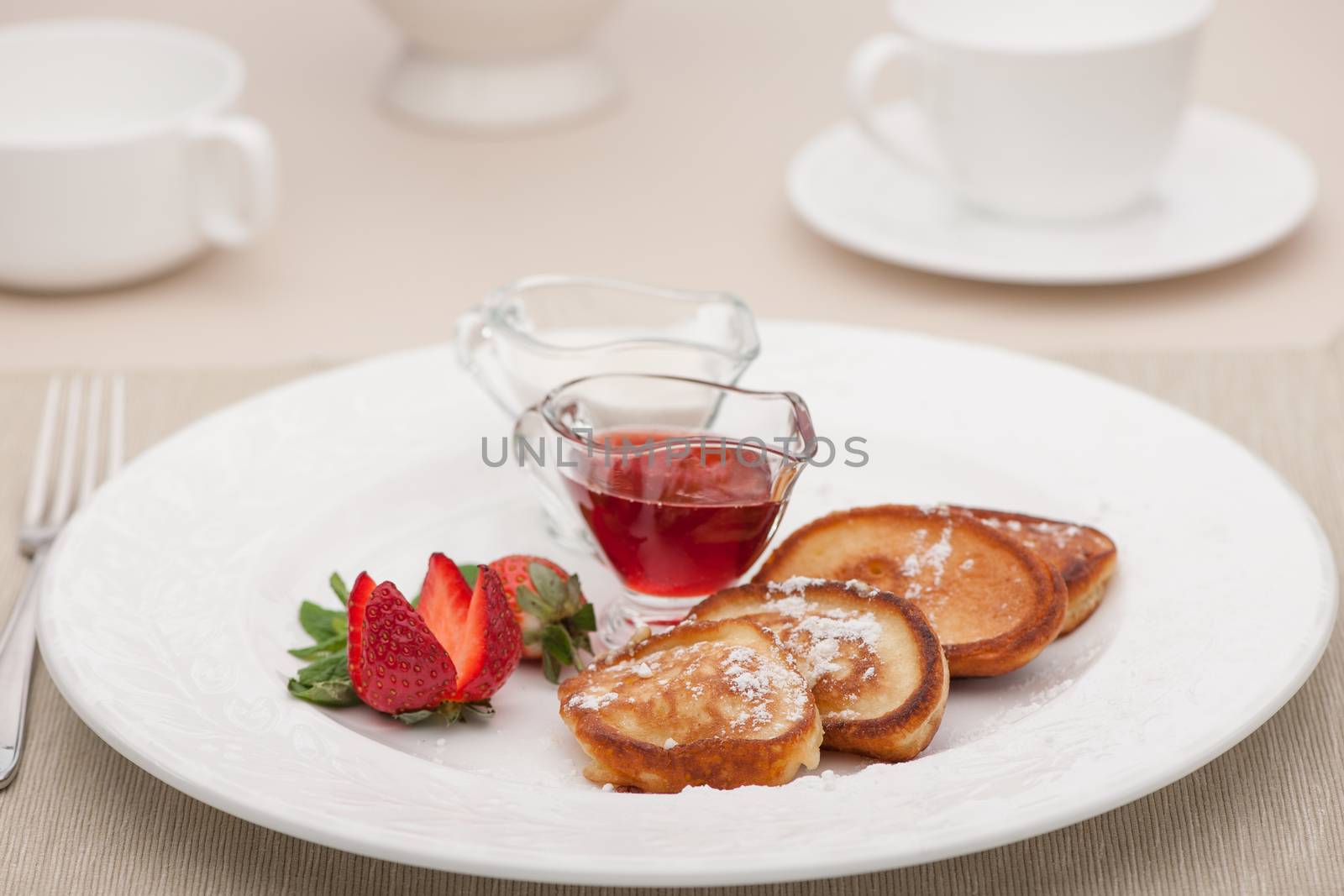 breakfast served with toast with strawberries and milk