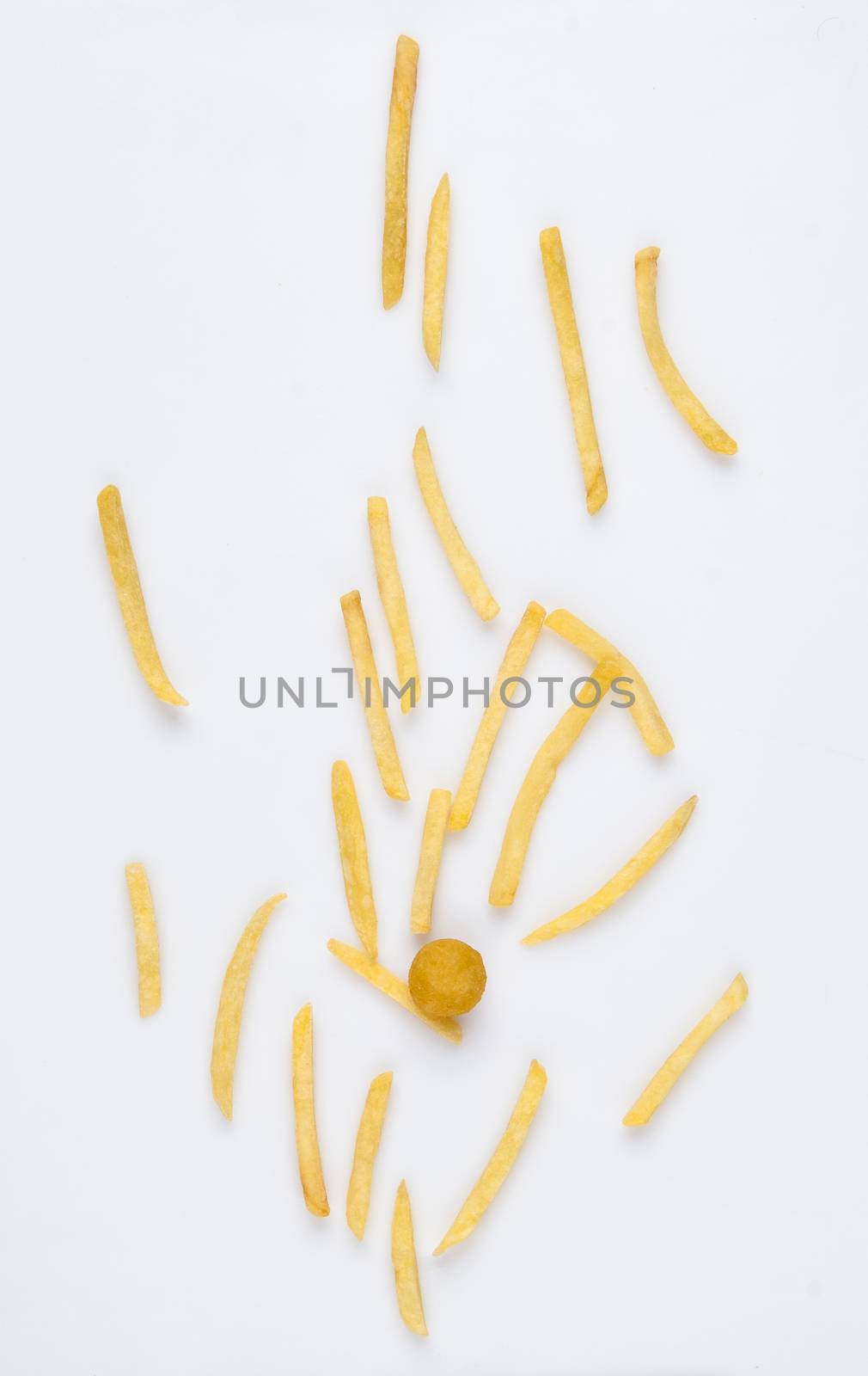 on a white background fried french fries. studio photo of fried french fries on white background