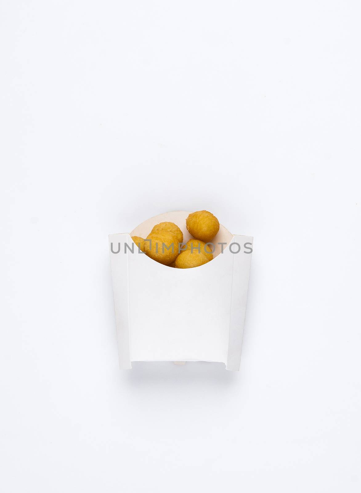 fried chicken balls in a white box on a white background. studio picture of fried chicken balls