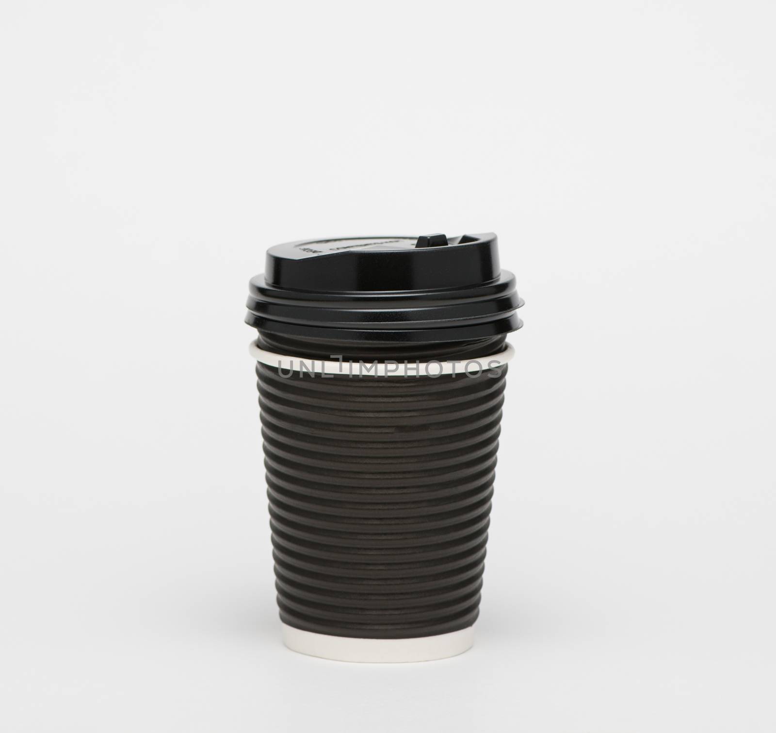 black paper cup coffee in takeaway isolated on white background