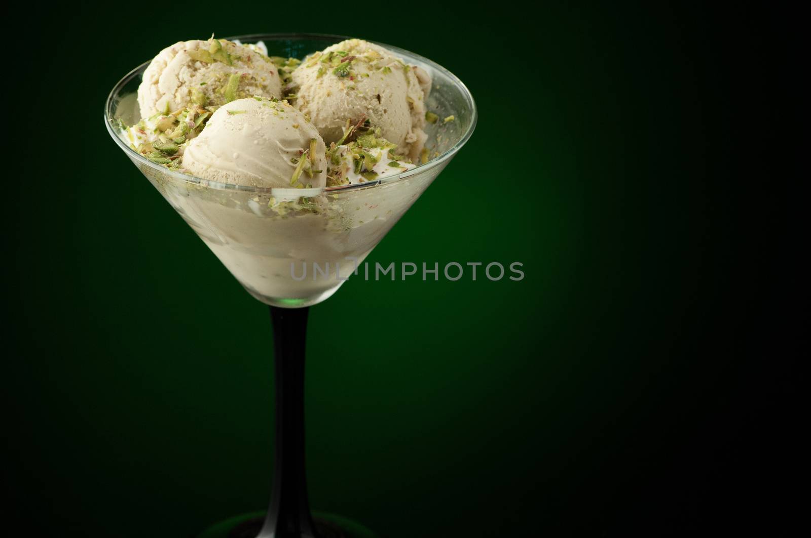 Ice cream in a vase on a dark background