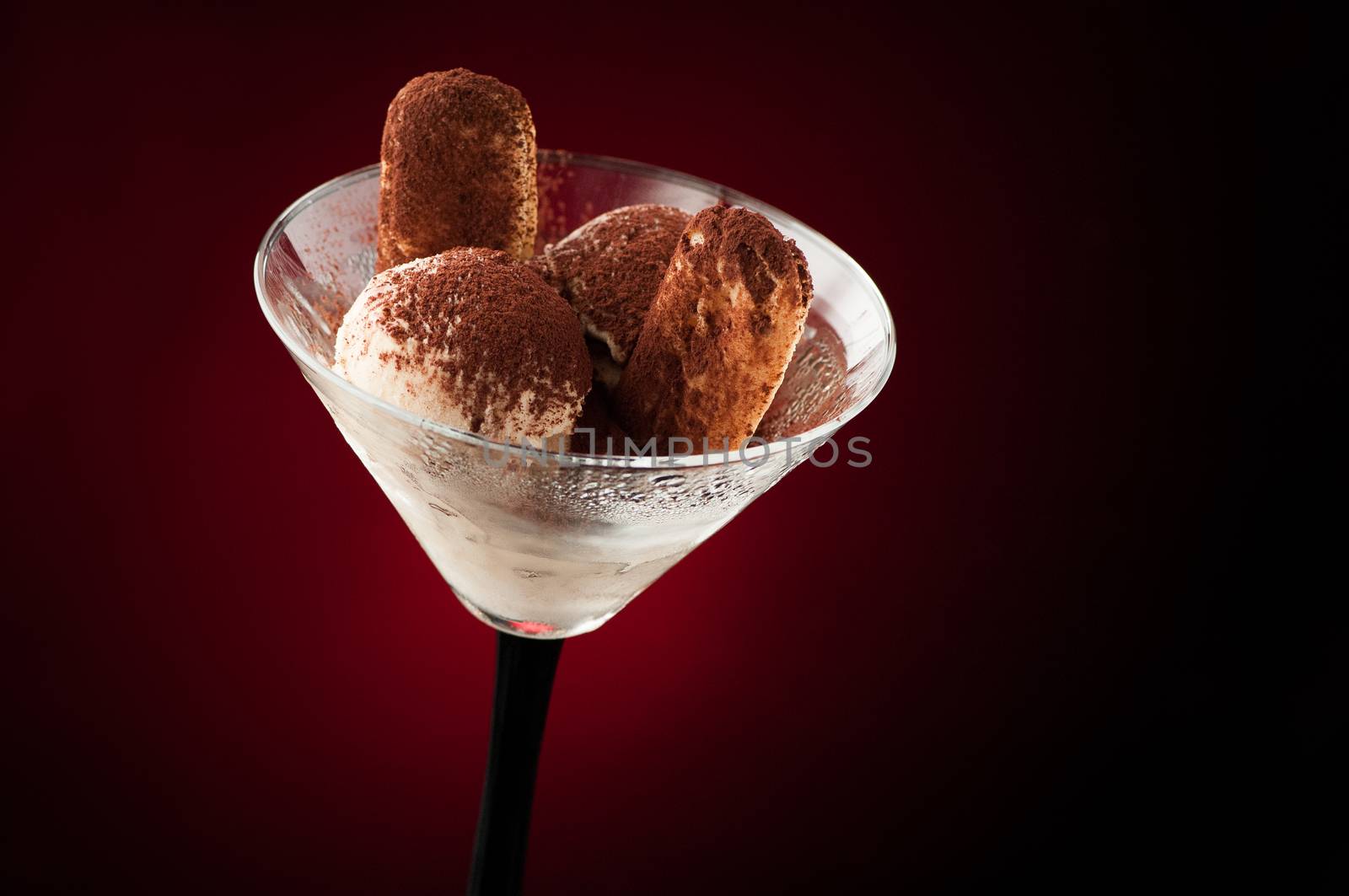 Ice cream in a vase on a dark background