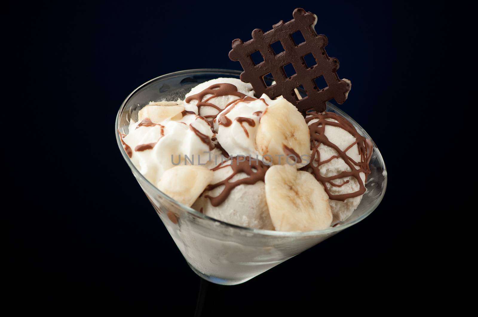 Ice cream in a vase on a dark background