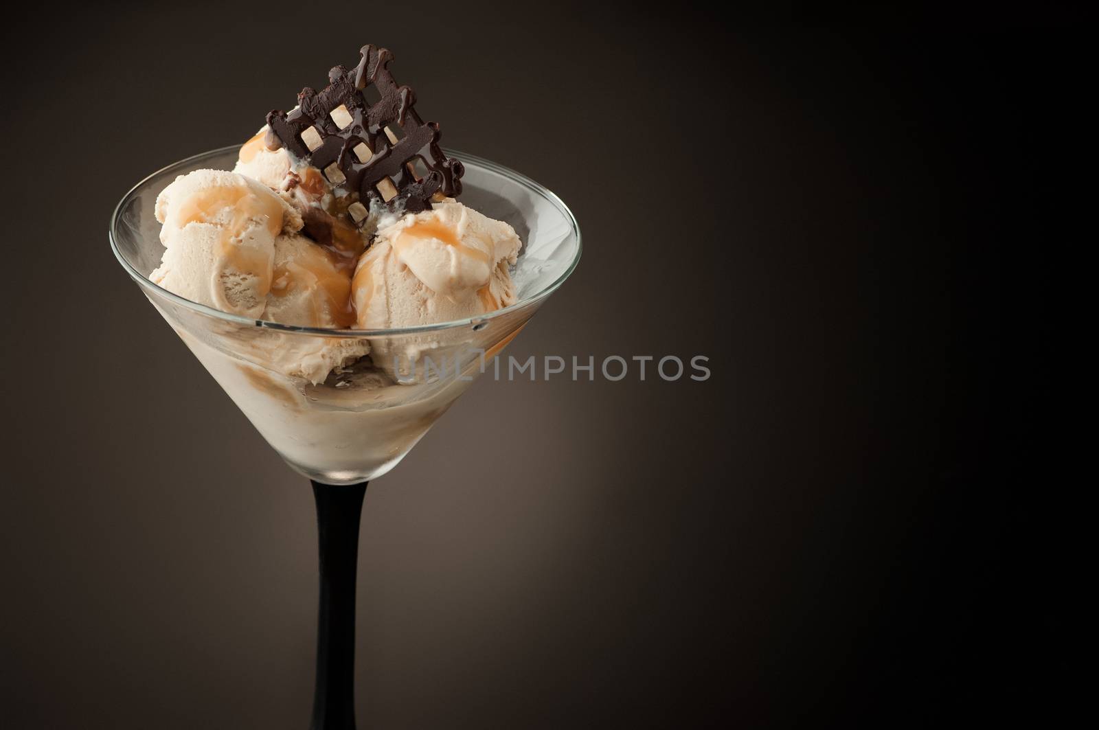 Ice cream in a vase on a dark background