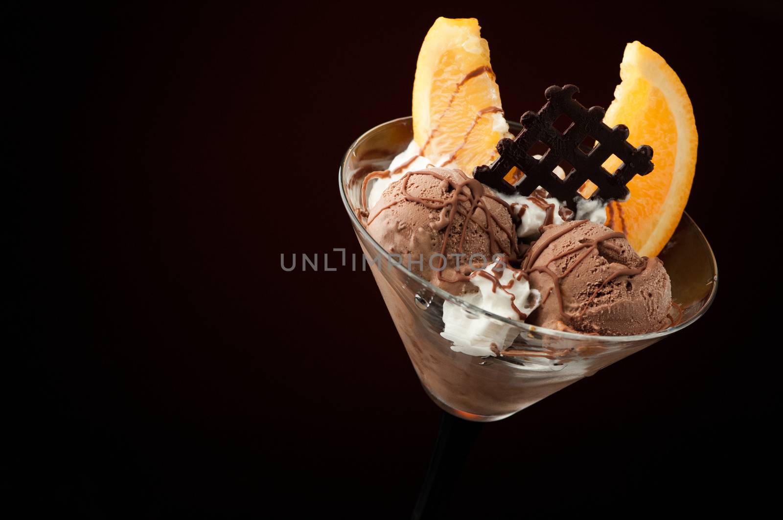 Ice cream in a vase on a dark background