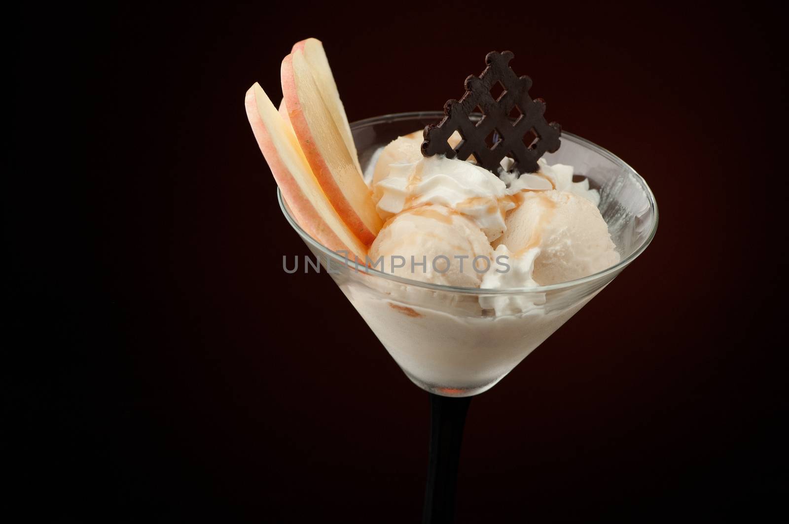 Ice cream in a vase on a dark background