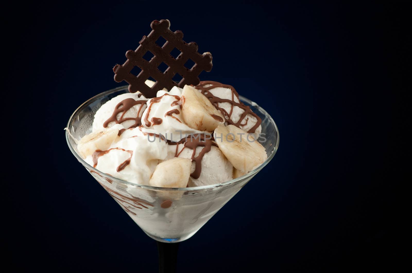 Ice cream in a vase on a dark background