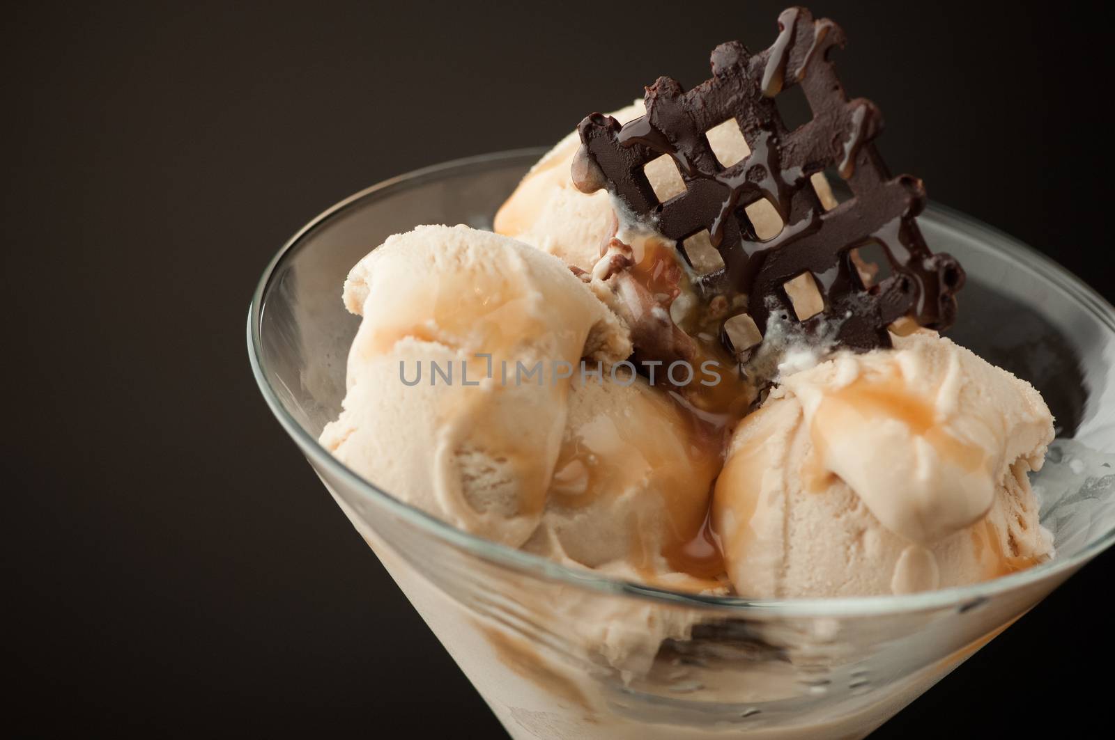 Ice cream in a vase on a dark background