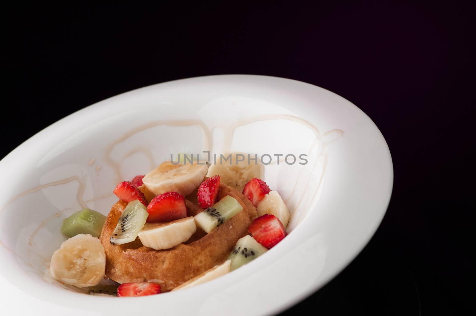 ice cream in a round white plate