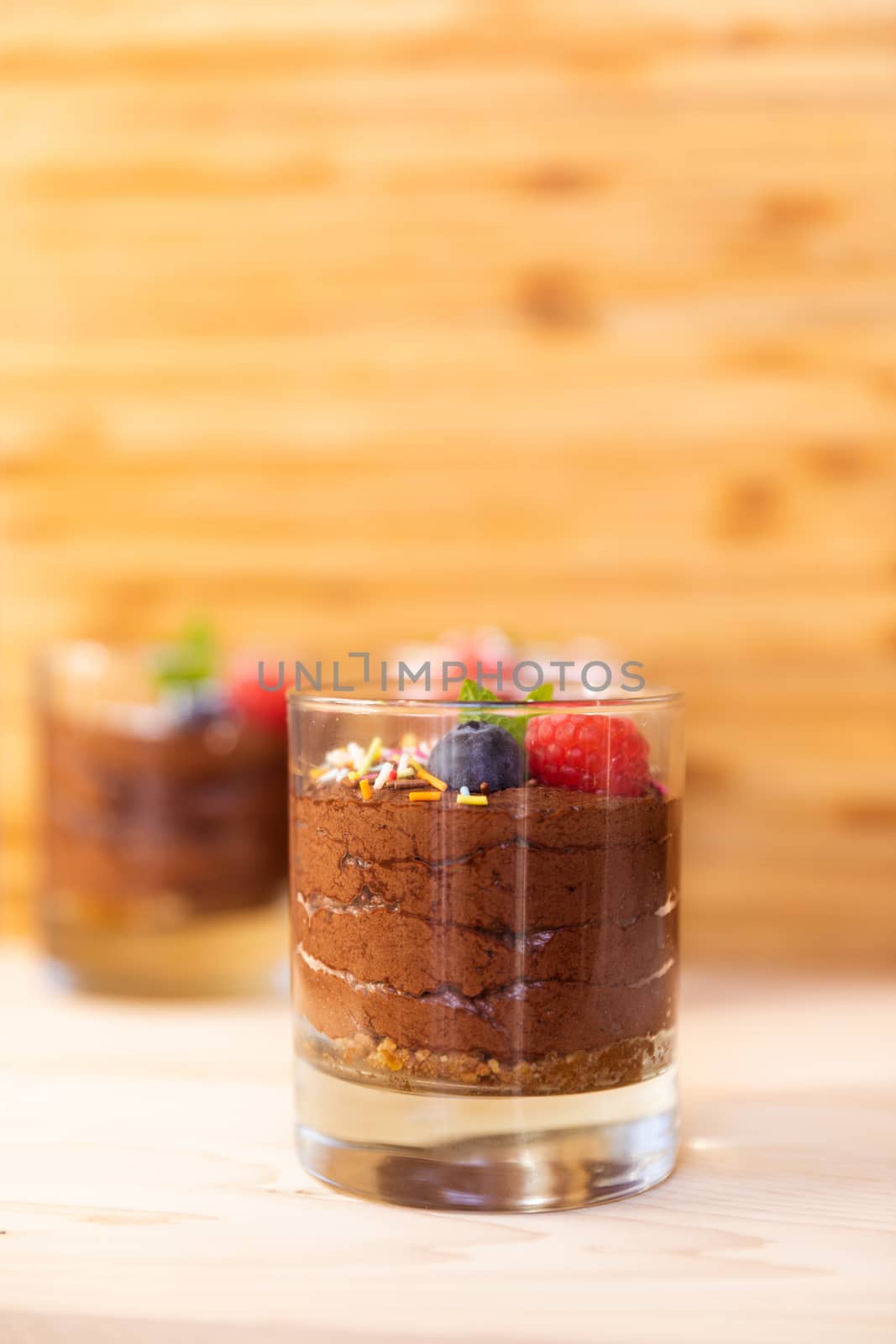 Group shot with glasses filled with chocolate mousse