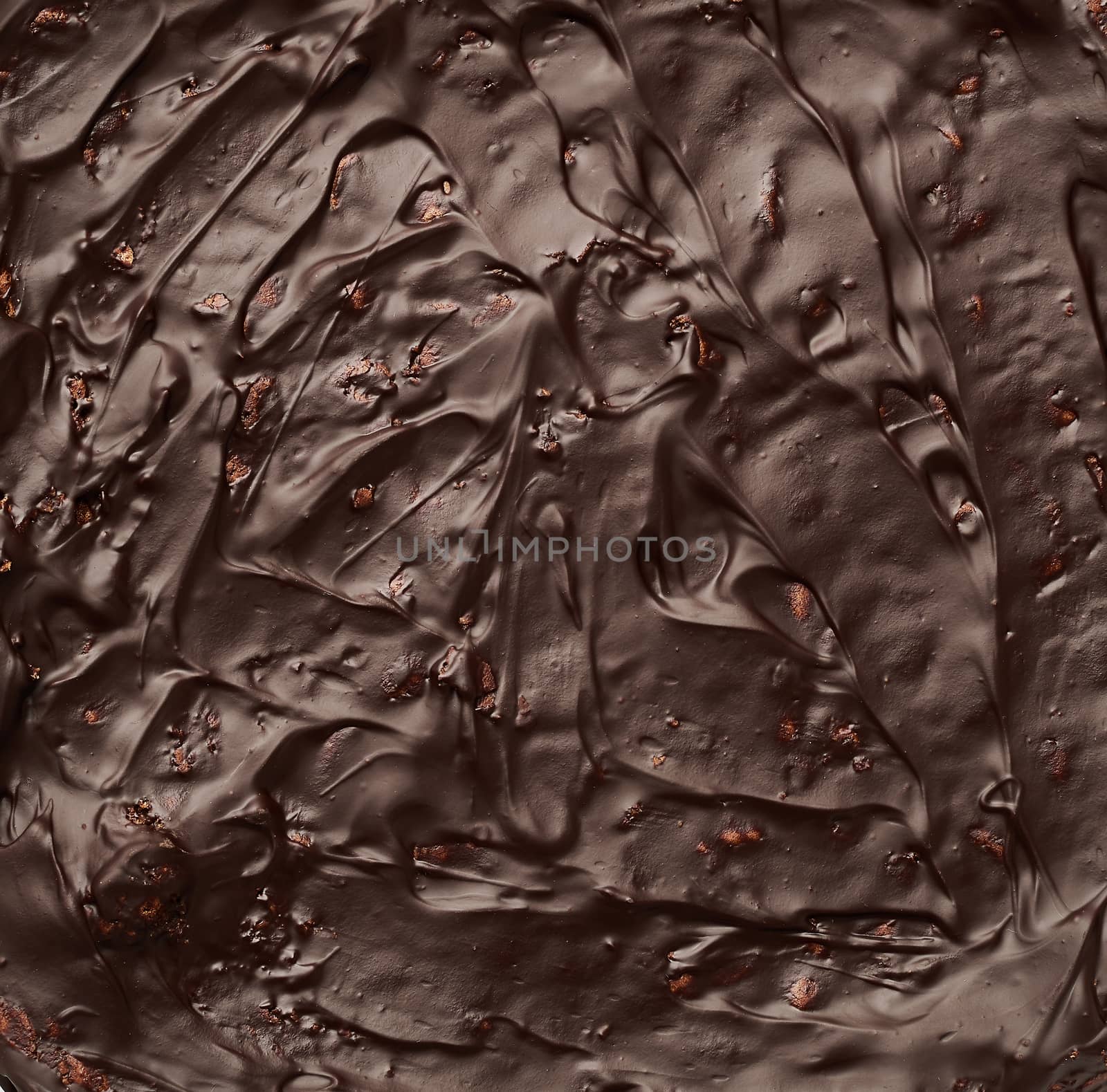 texture of baked brownie chocolate cake with chocolate poured. Cooked homemade food. Chocolate pastry. Sweet meal, homemade dessert.