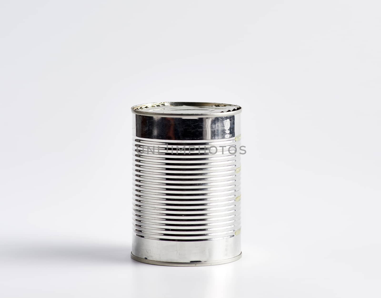 hard iron can for food preservation on a white background Closeup 