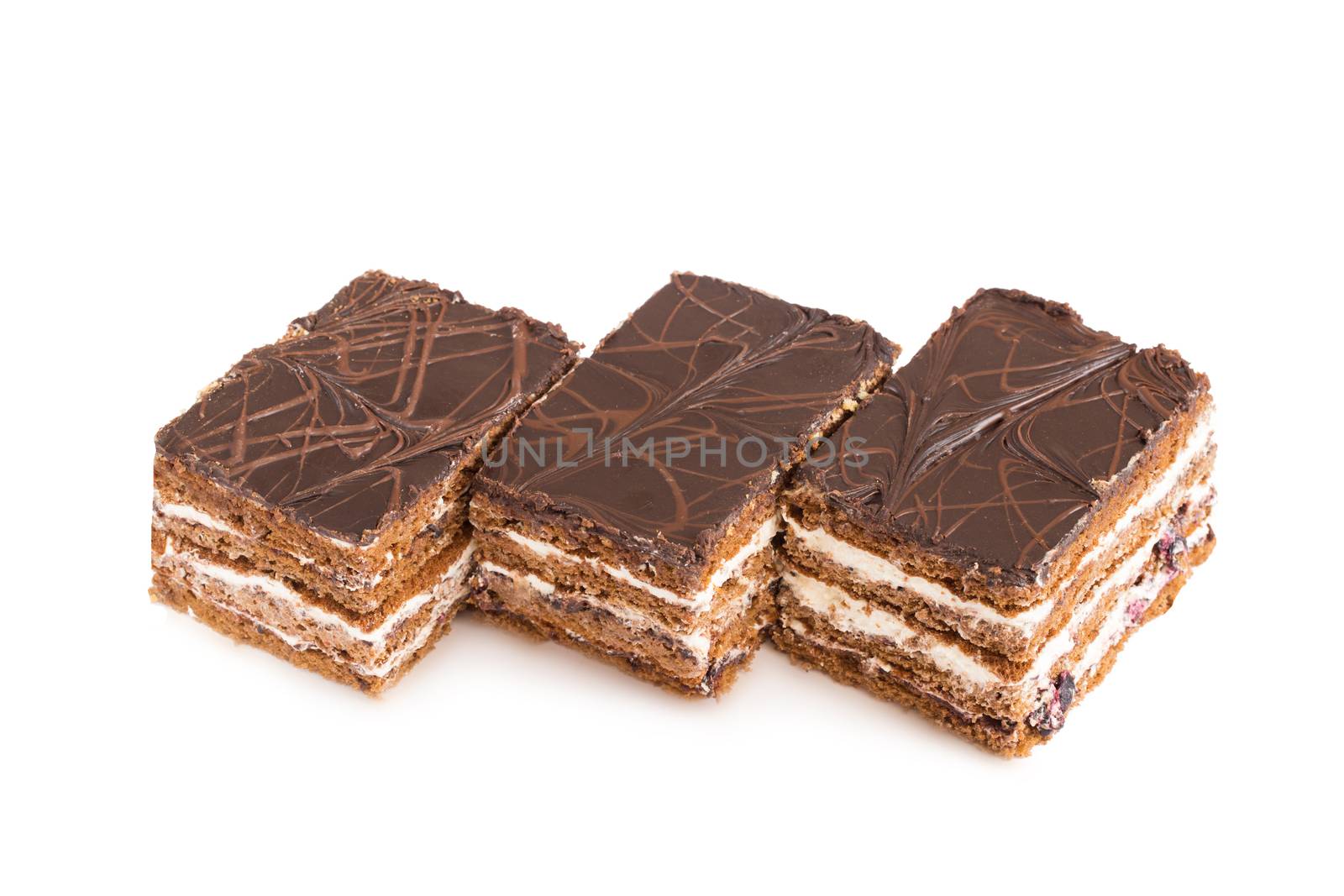 A confection isolated on a white background. Sweet cakes, cookies, muffins, shortbread cookies in front of a white background