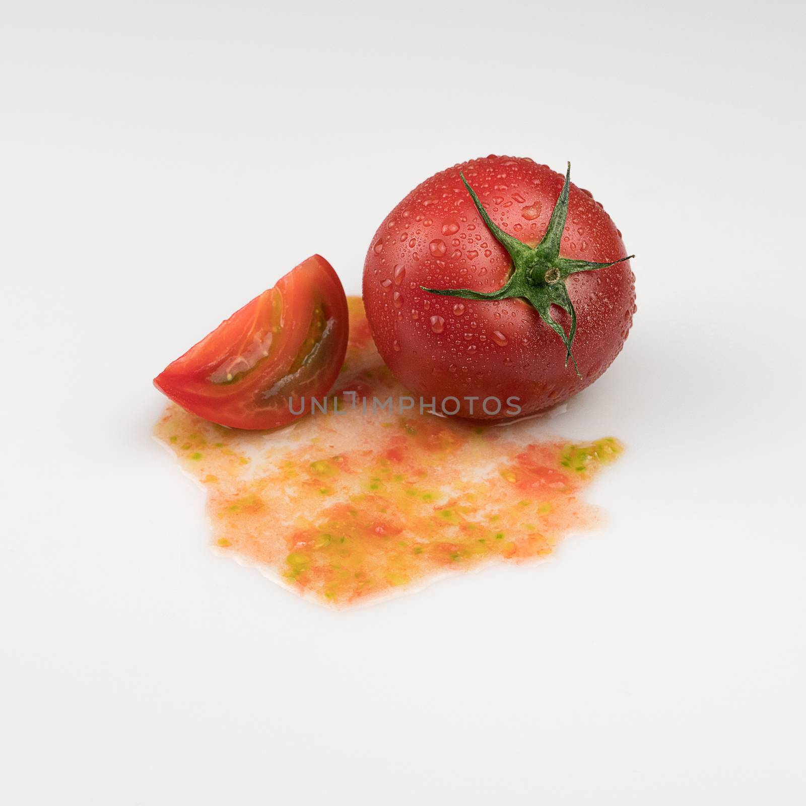 tomatoes on a white background by A_Karim