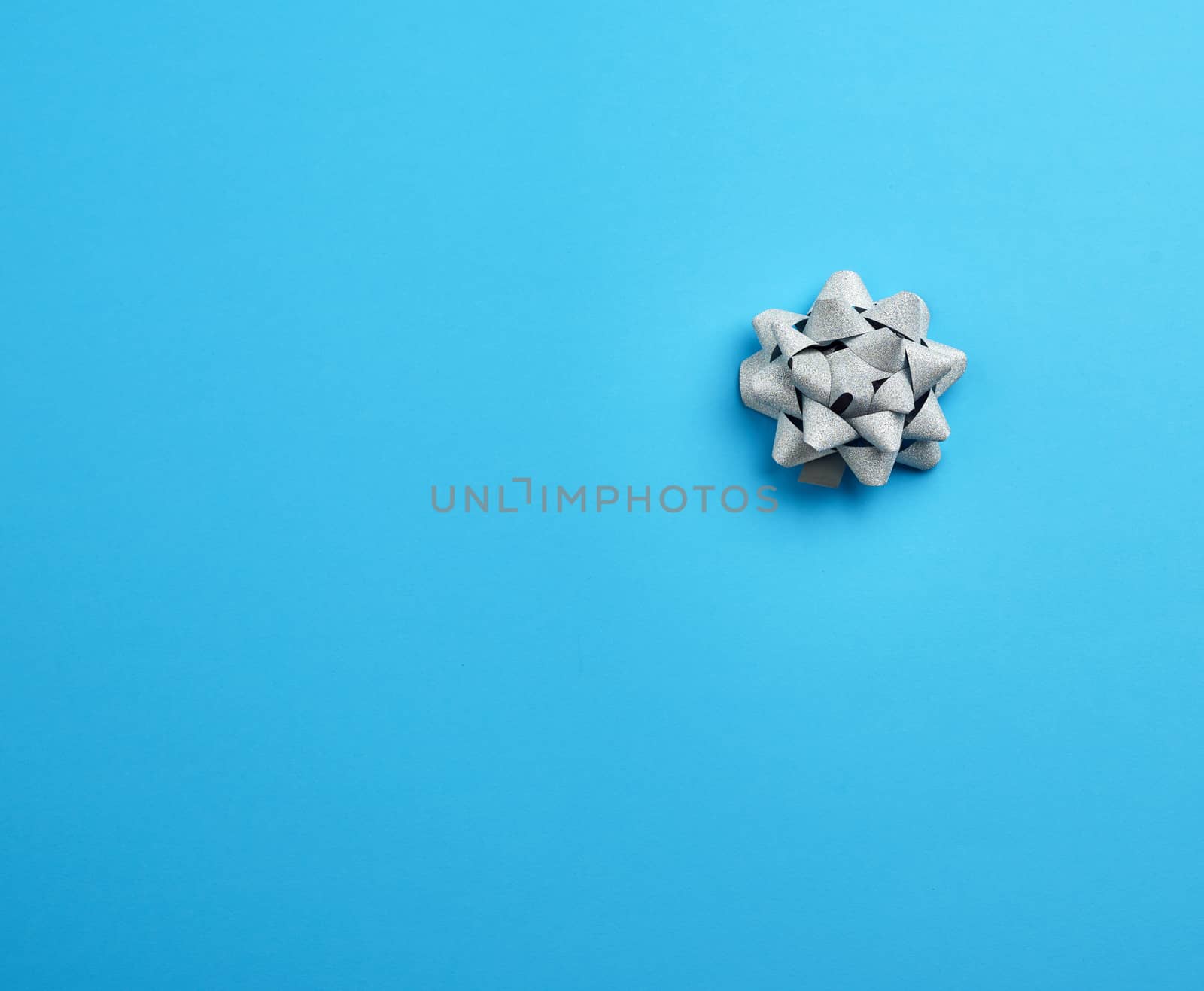 Beautiful abstract blue design template with silver bow. Luxury design. Holiday background