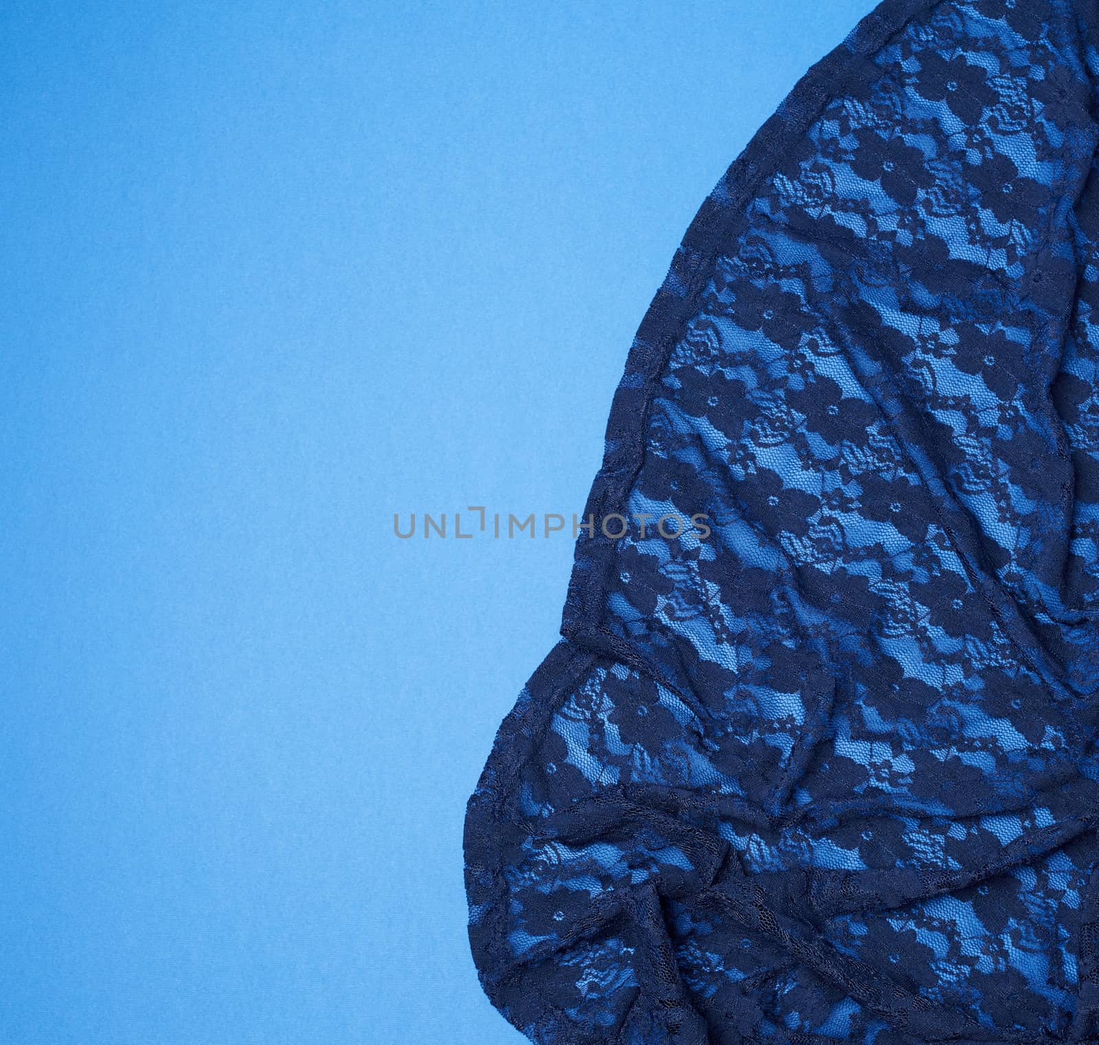 fragment of blue guipure, full frame, copy space