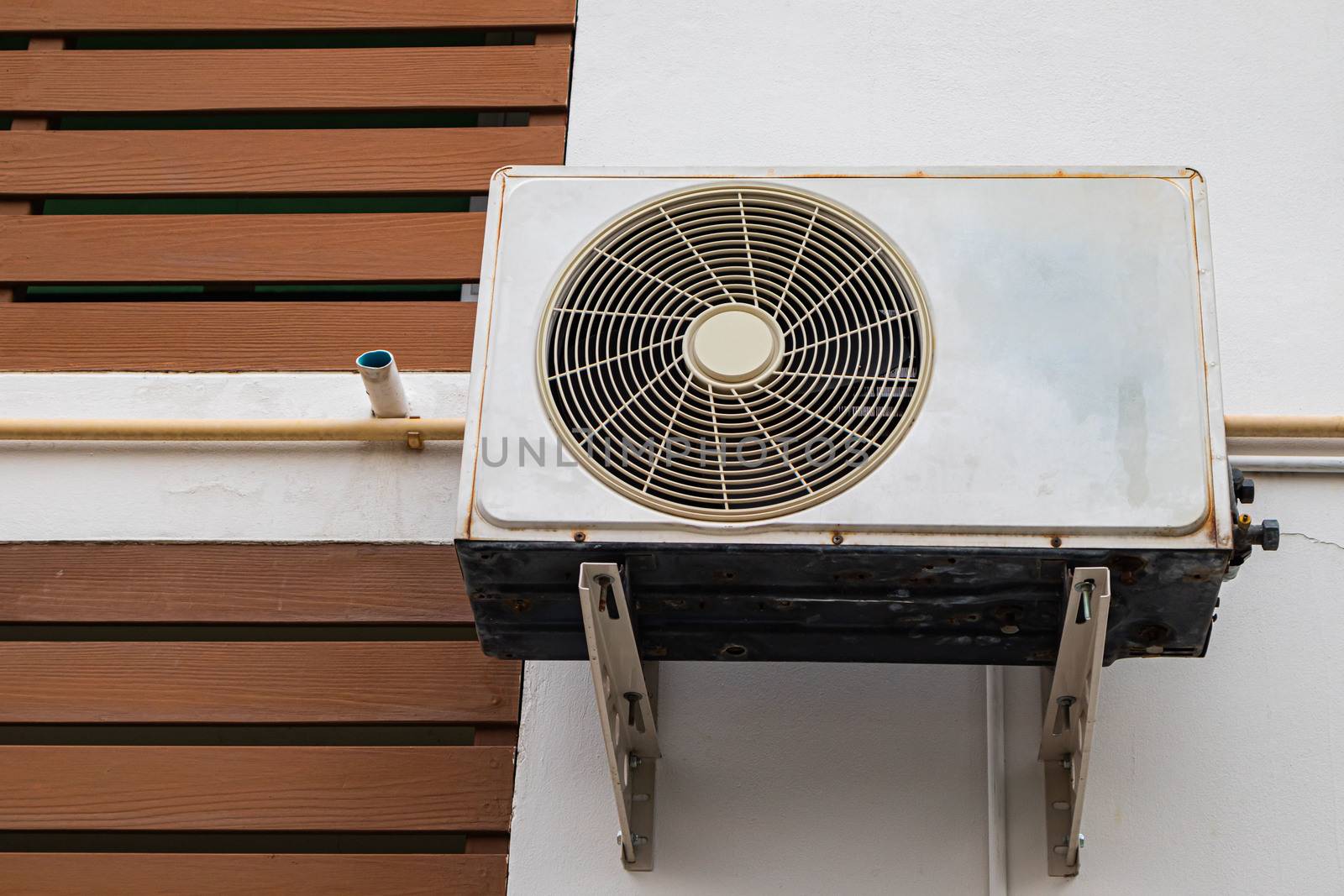 air conditioning systems installed on the walls of the exterior building