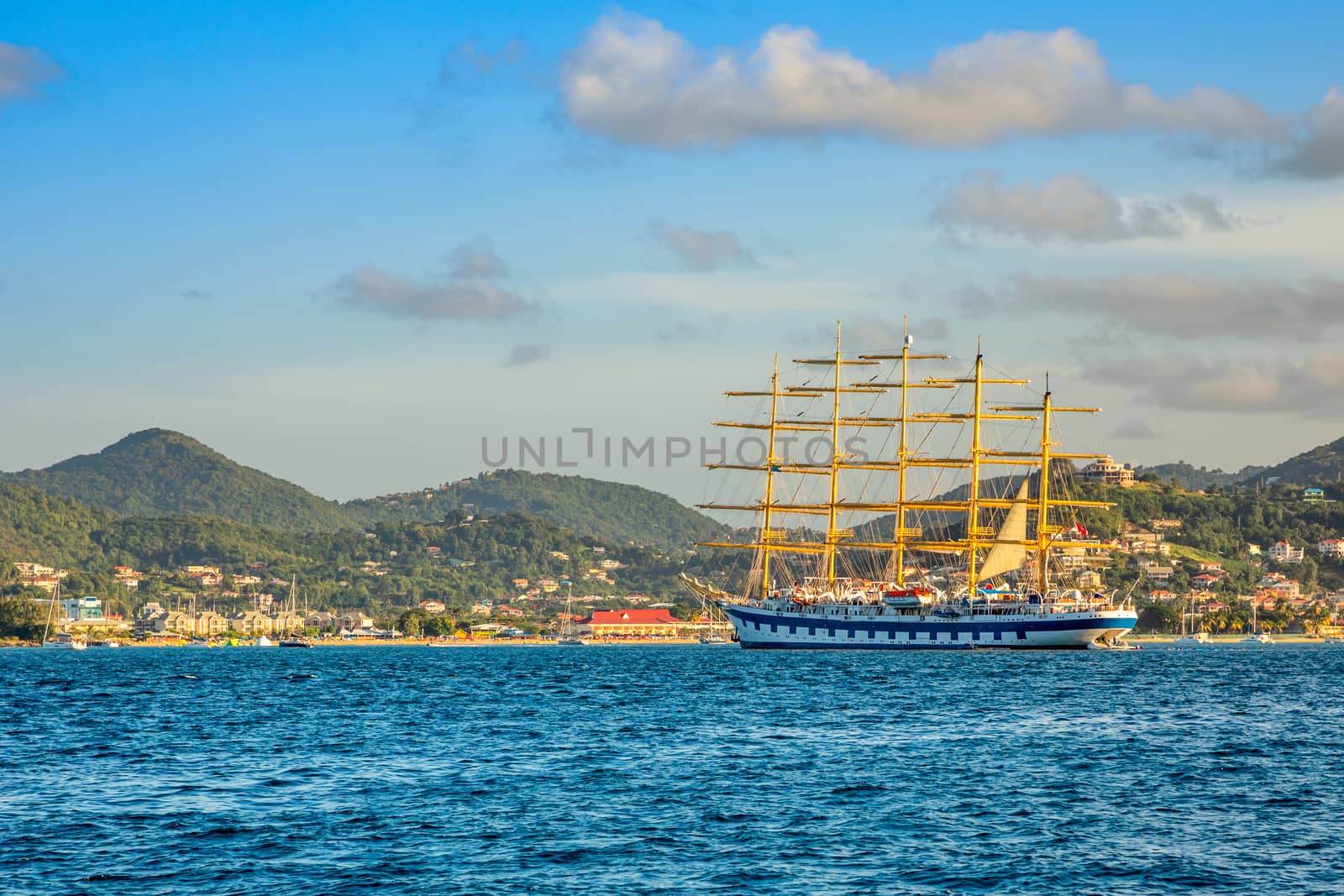 big naval clipper anchored at the Rodney bay with town in the background, Saint Lucia, Caribbean sea