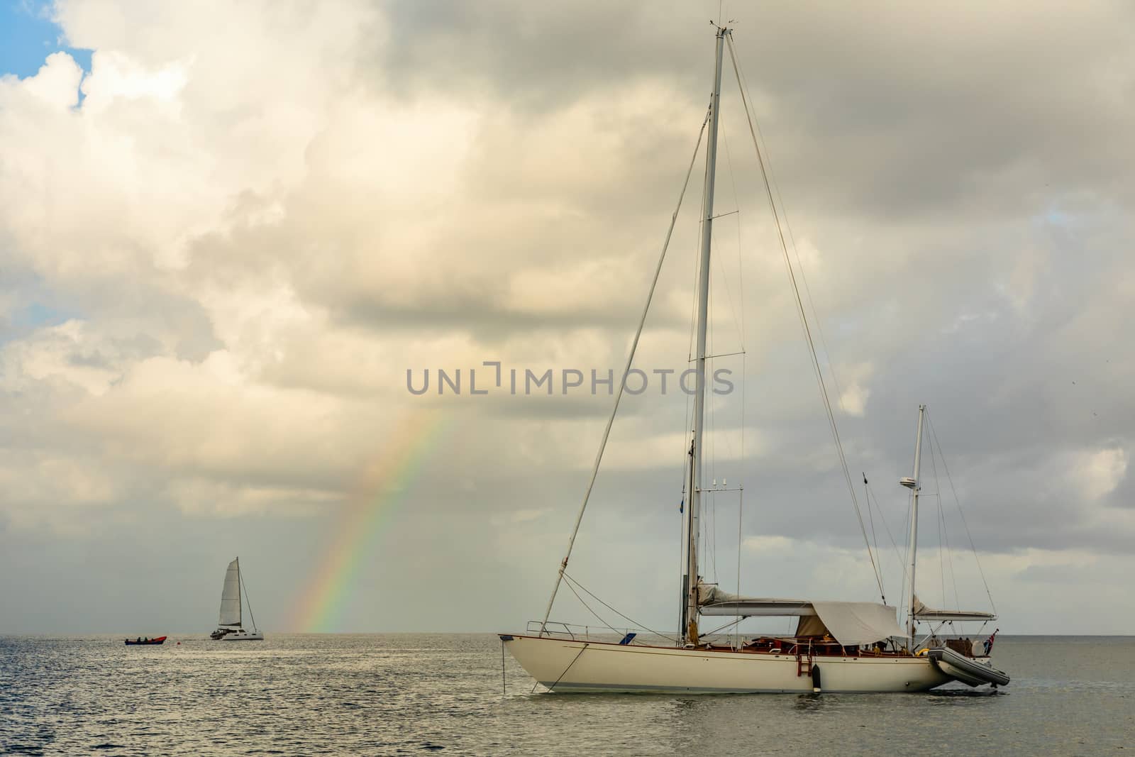 Yachts at  Rodney bay with rainbow in the backround, Saint Lucia, Caribbean sea